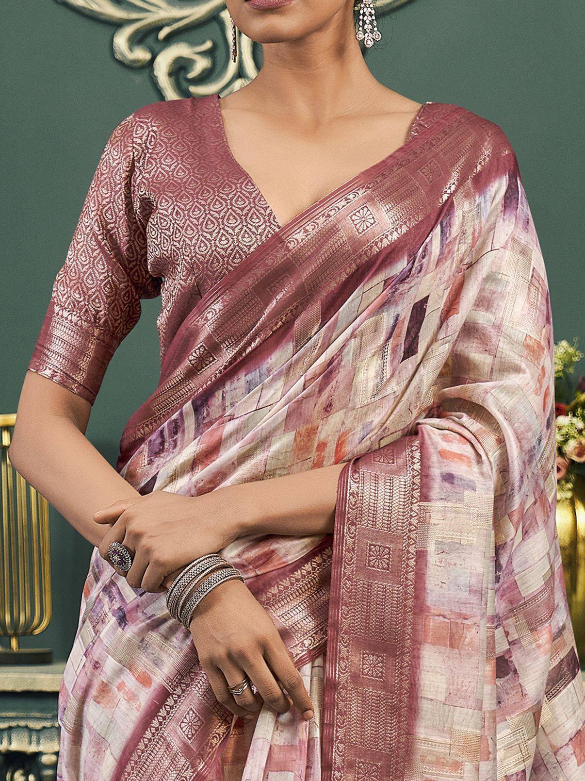 Elegant pink printed saree with intricate patterns and matching blouse, perfect for ethnic occasions