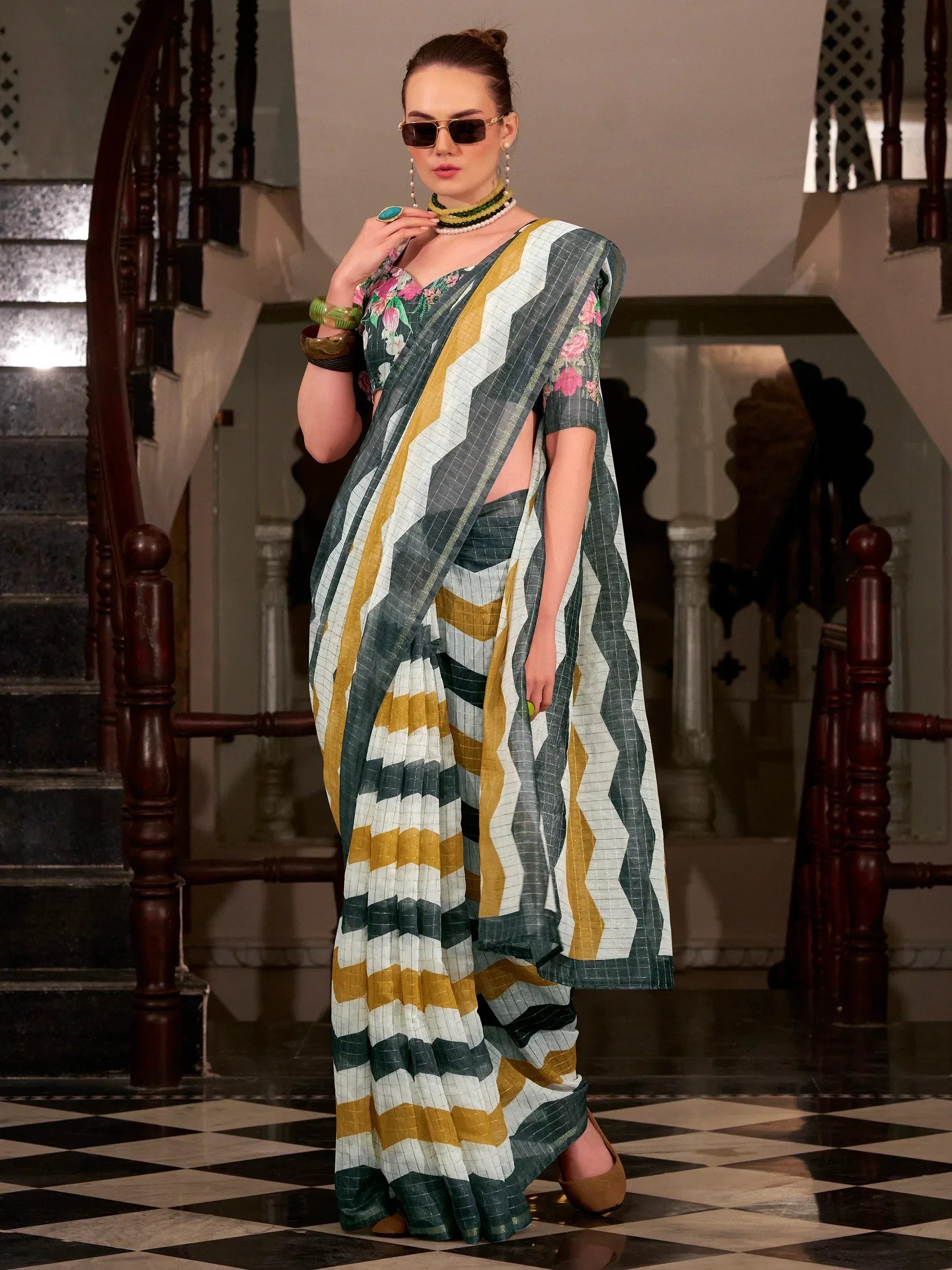 Stylish floral and geometric saree with modern design, perfect for ethnic wear occasions.