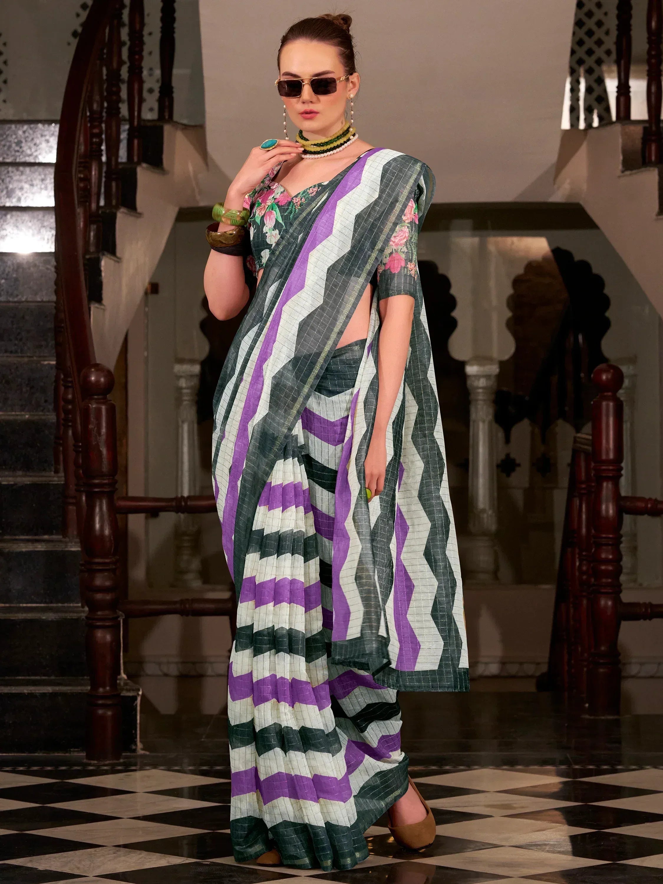 Stylish purple and green printed saree with floral blouse, perfect for ethnic occasions