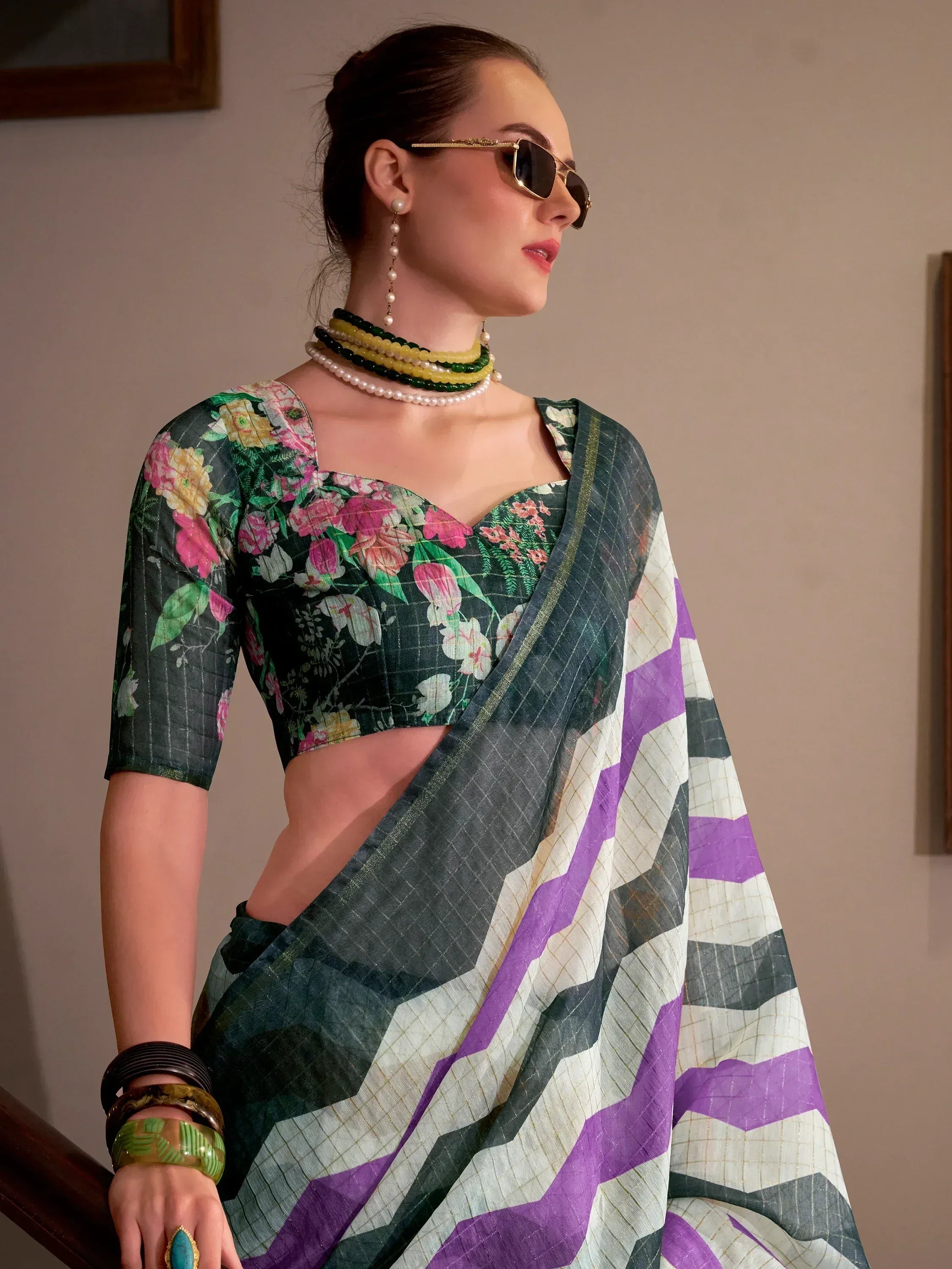 Floral blouse with geometric saree, stylish ethnic wear for women