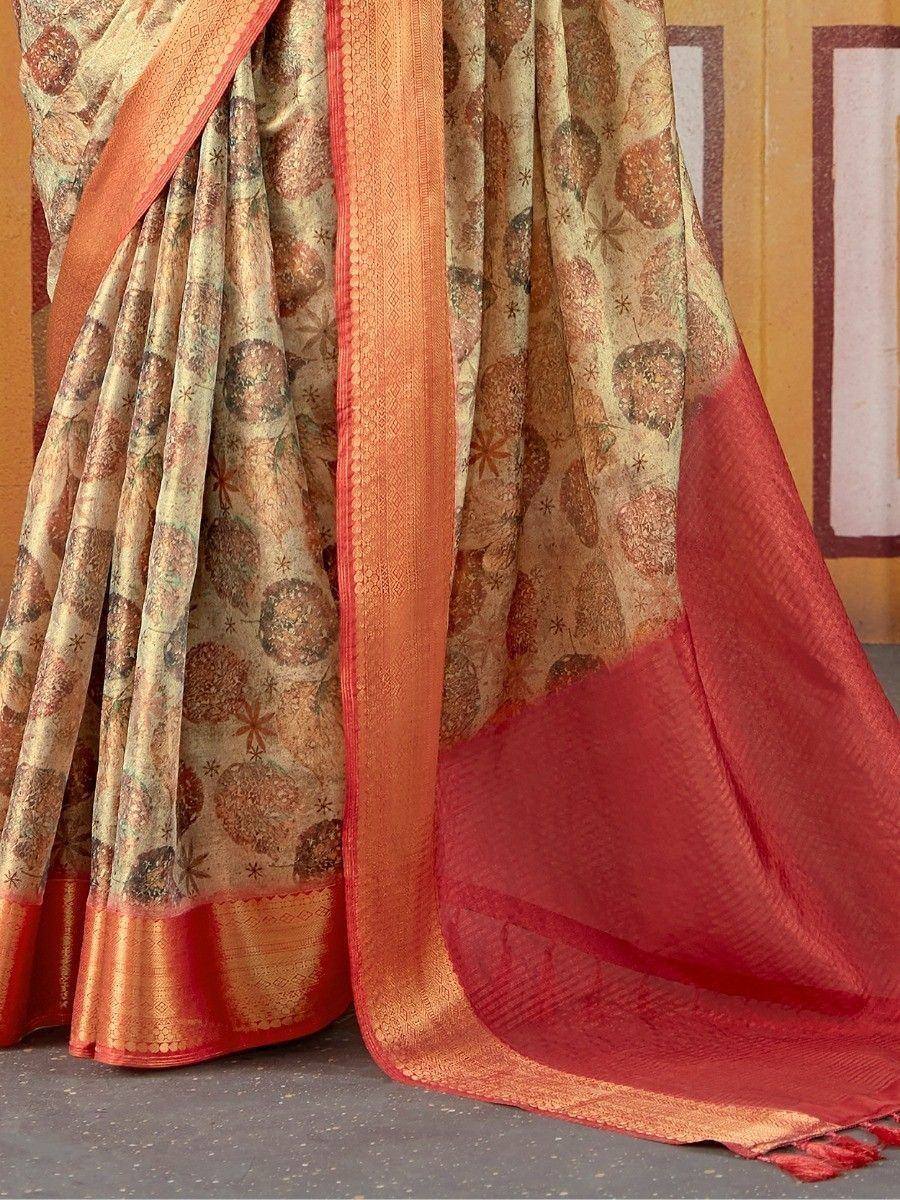 Elegant Indian saree with floral motifs and rich red border, perfect for ethnic occasions