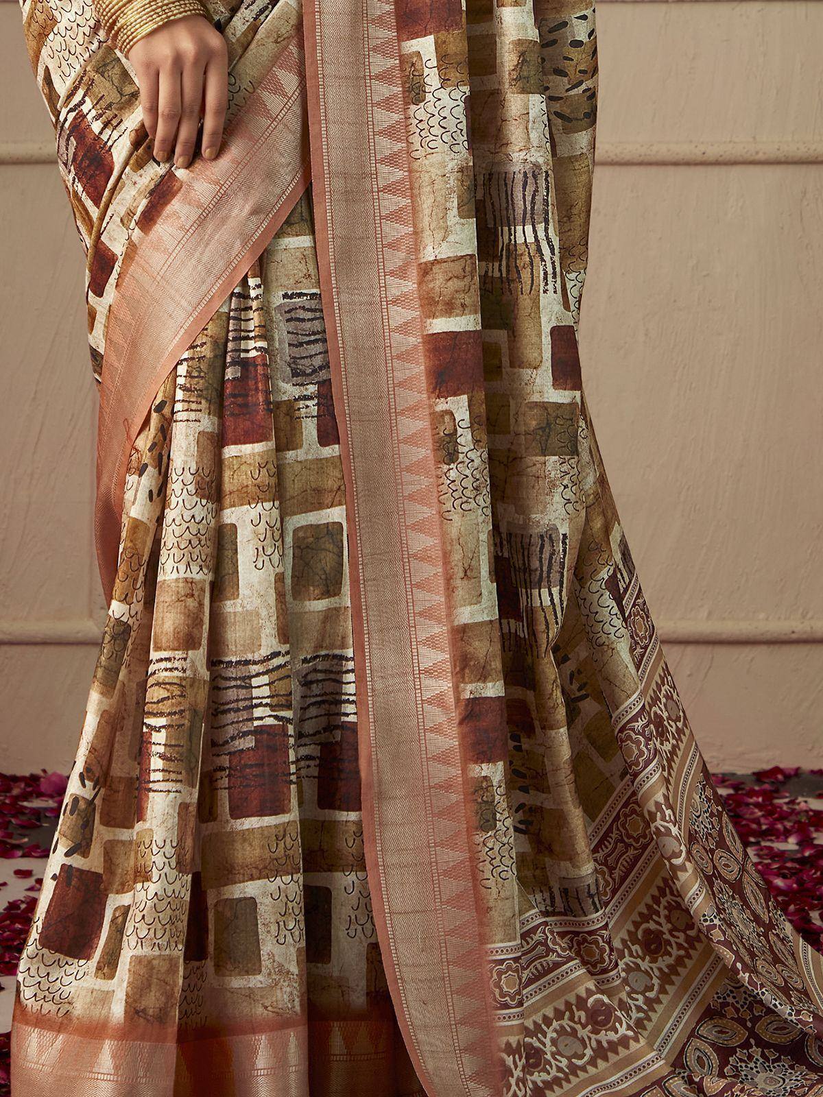 Elegant Indian saree with abstract block print pattern in earthy tones, perfect for ethnic wear occasions.