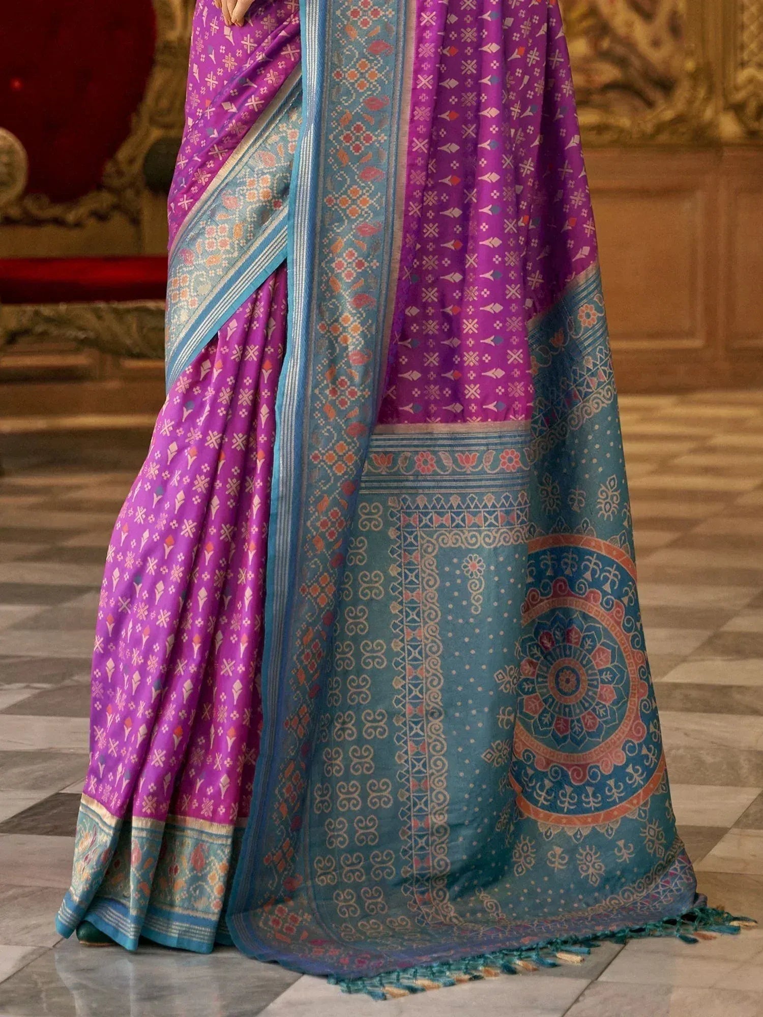 Purple and blue ethnic saree with intricate geometric and mandala patterns, perfect for Indian occasions