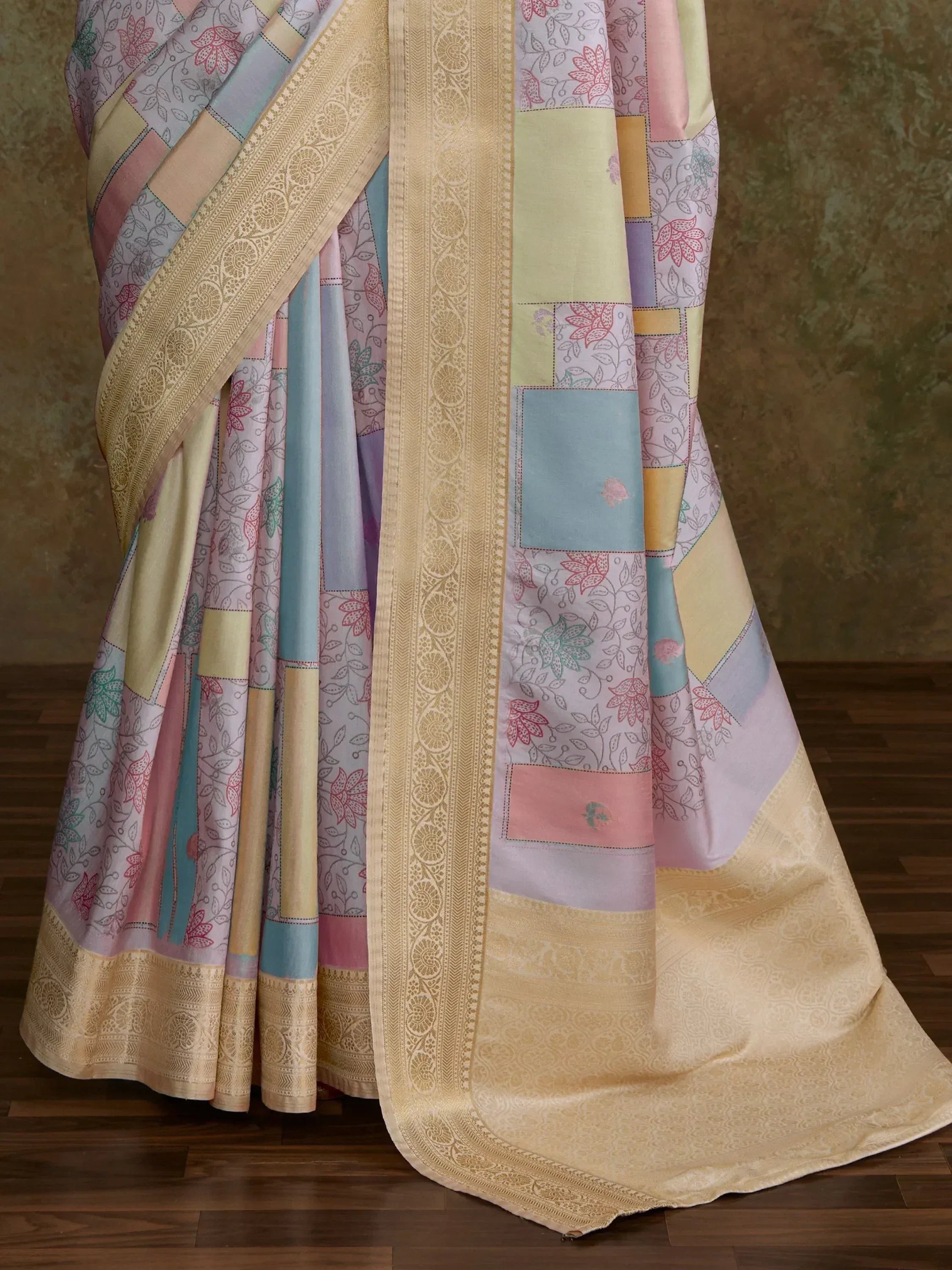 Pastel patchwork saree with floral print and golden border, ethnic Indian wear