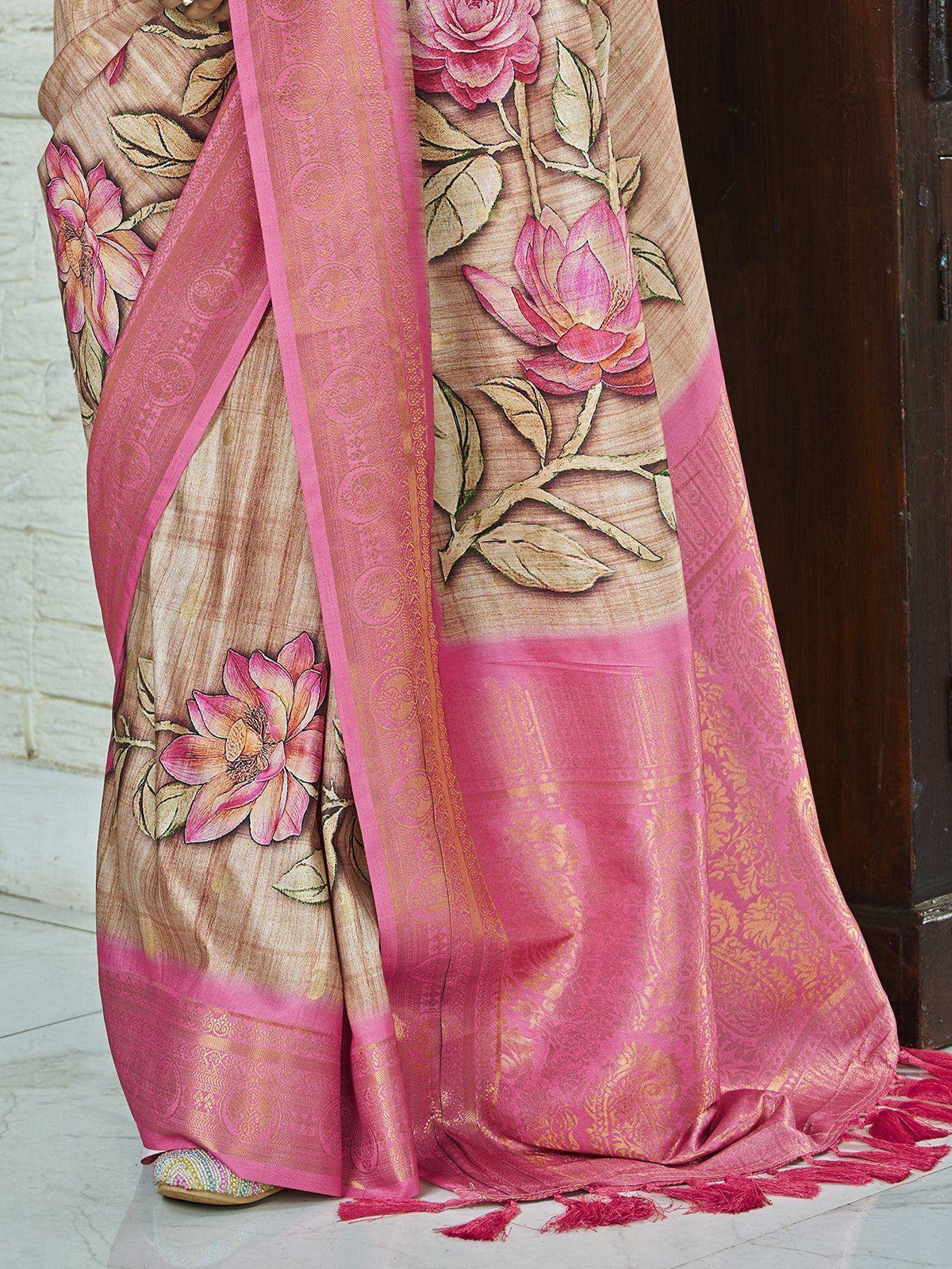 Pink floral printed saree with golden border and tassels, ethnic Indian wear