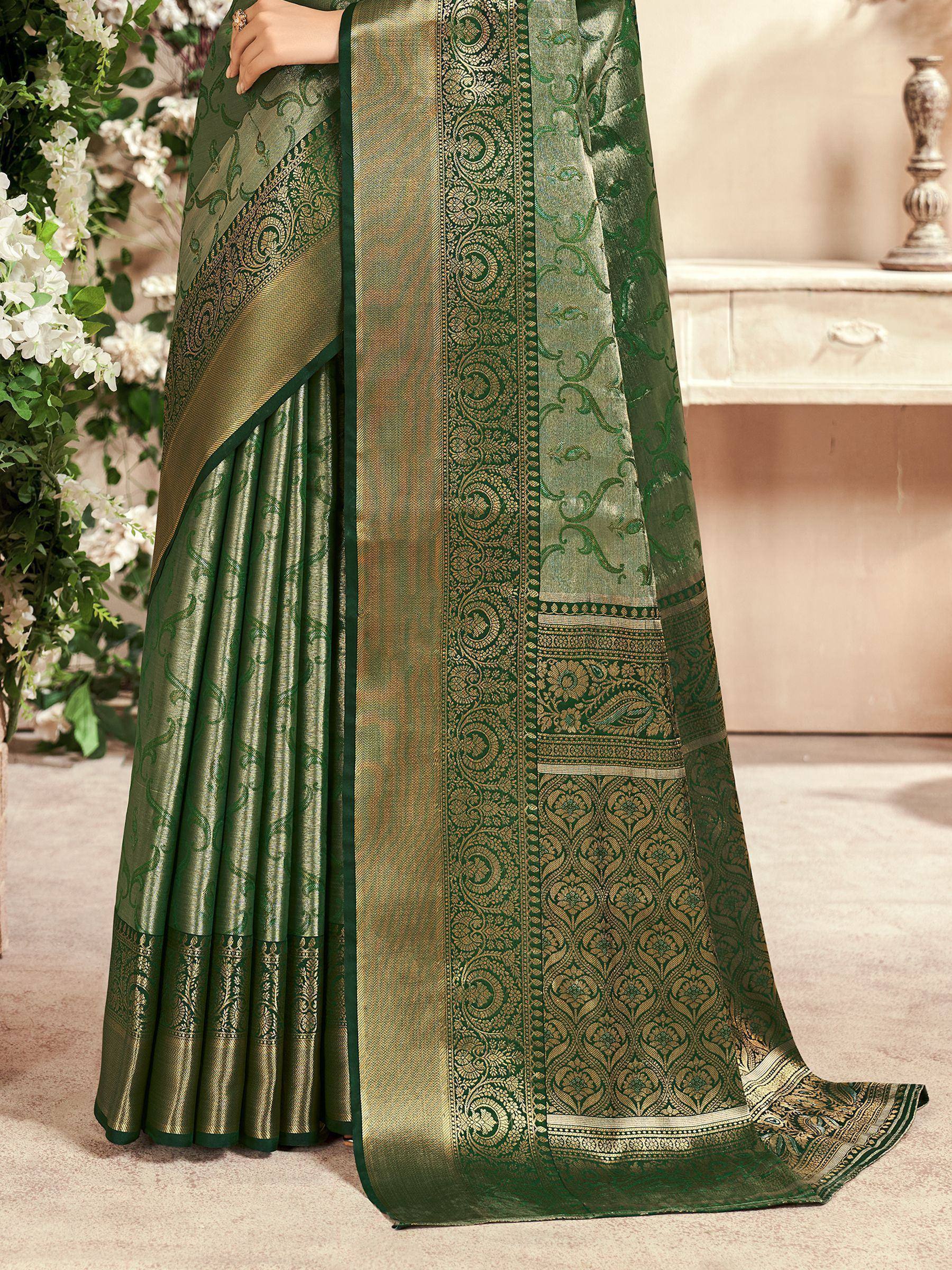 Emerald green designer saree with gold zari work, perfect for Indian ethnic wear occasions