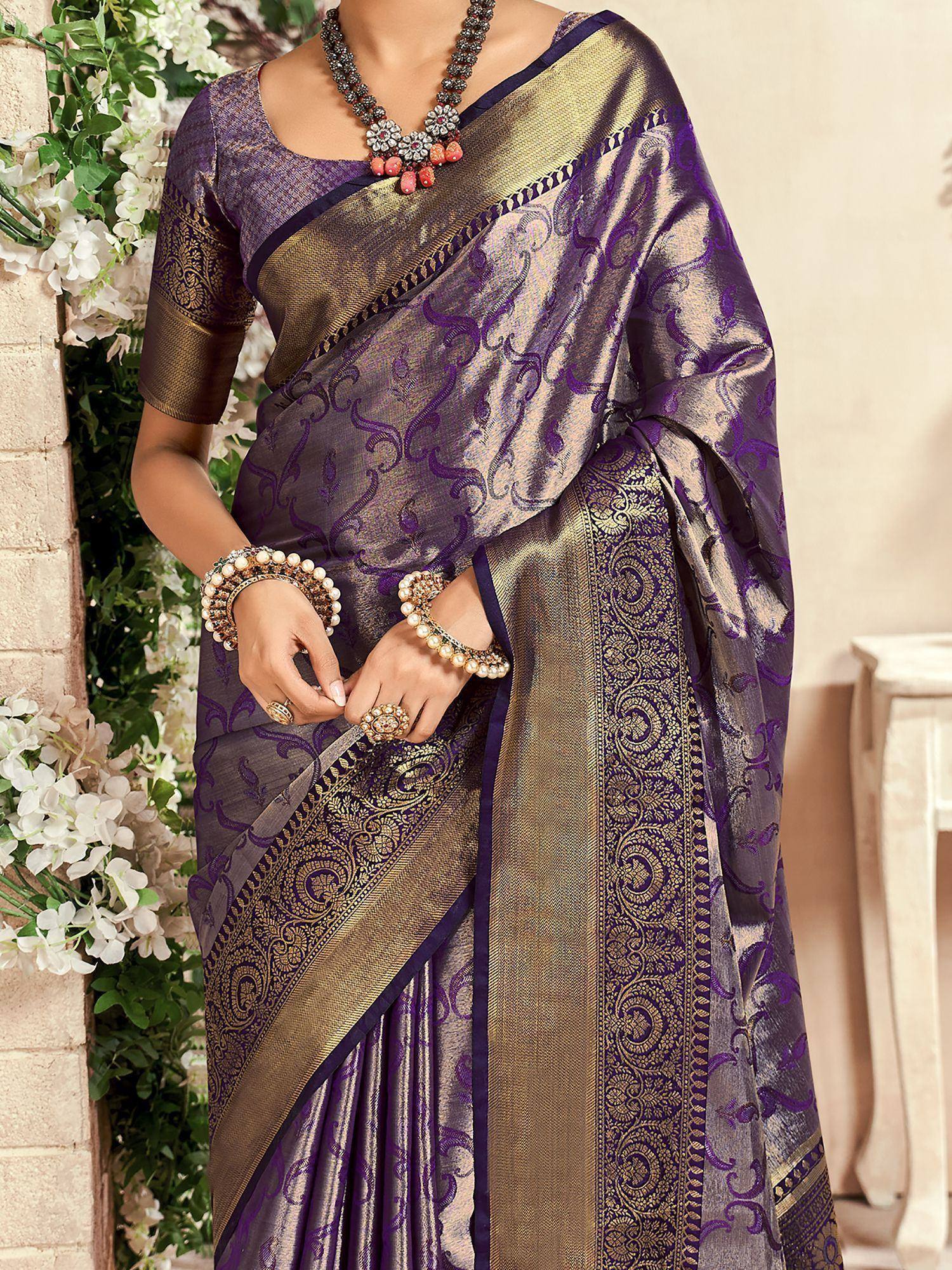 Purple and gold designer saree with intricate paisley patterns, perfect for Indian ethnic wear occasions
