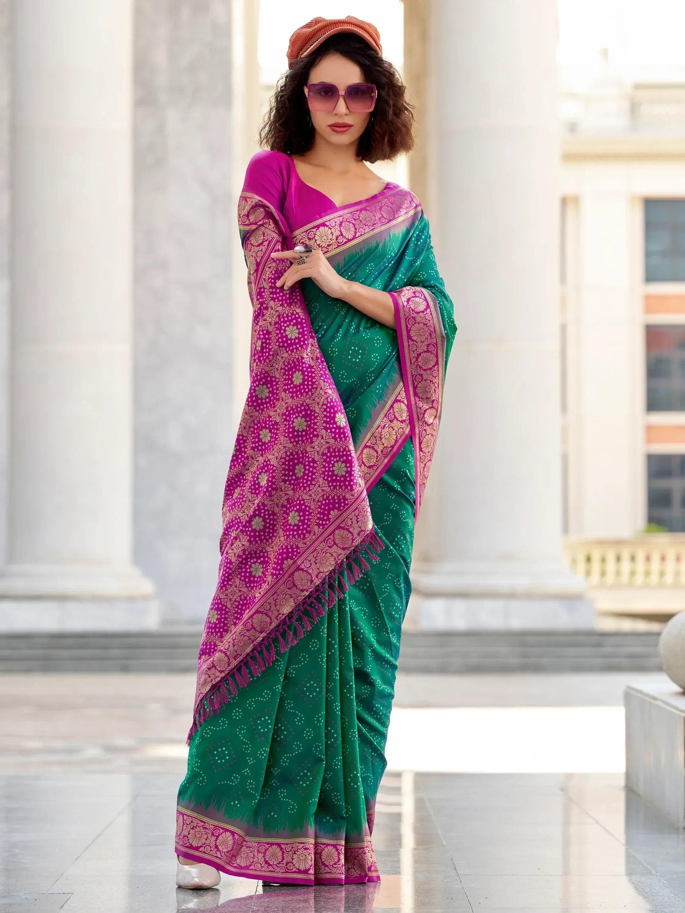 Green and pink designer saree with gold floral border, perfect for ethnic wear occasions