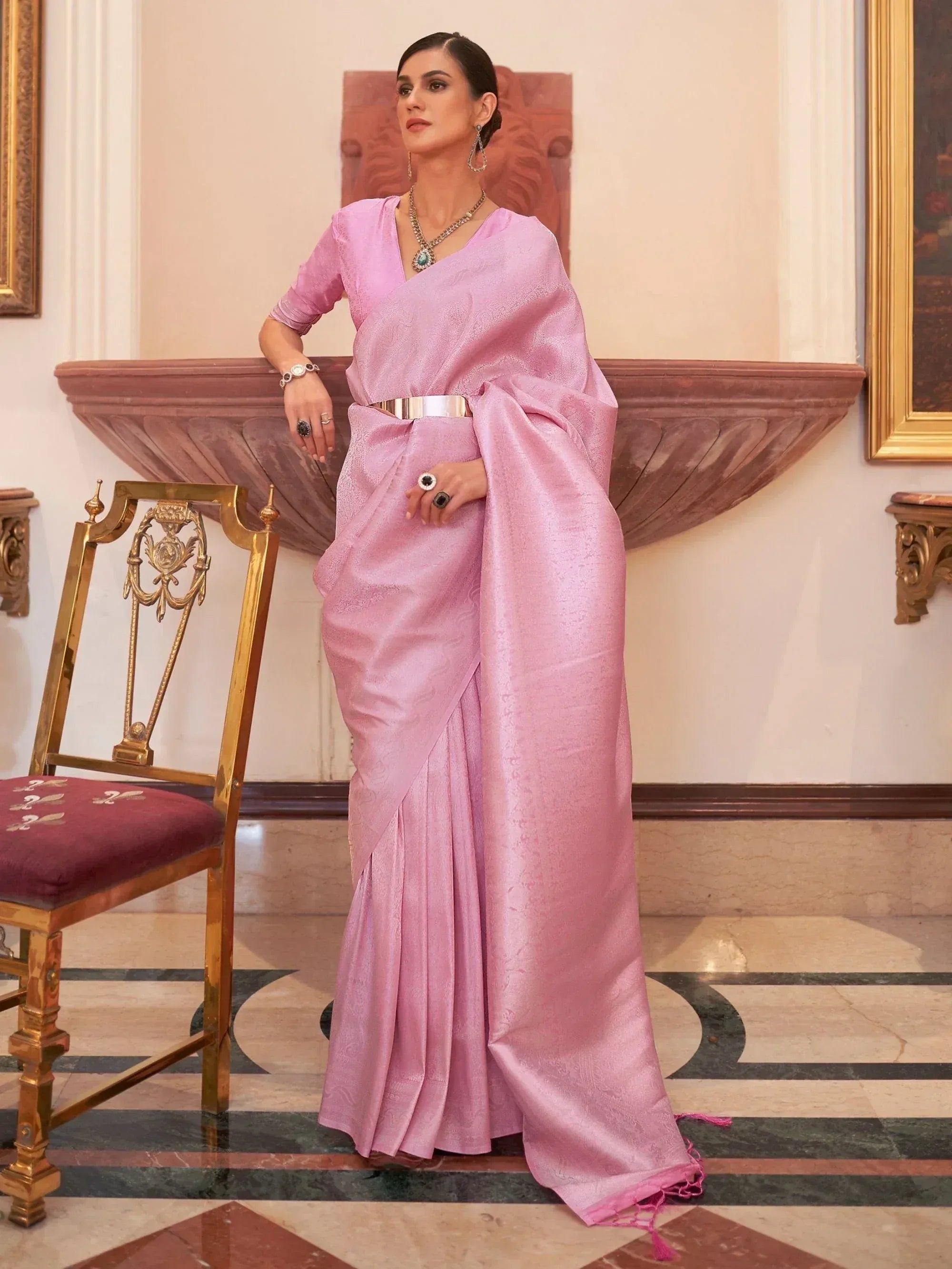 Elegant pink designer saree with metallic belt, perfect for Indian ethnic wear occasions