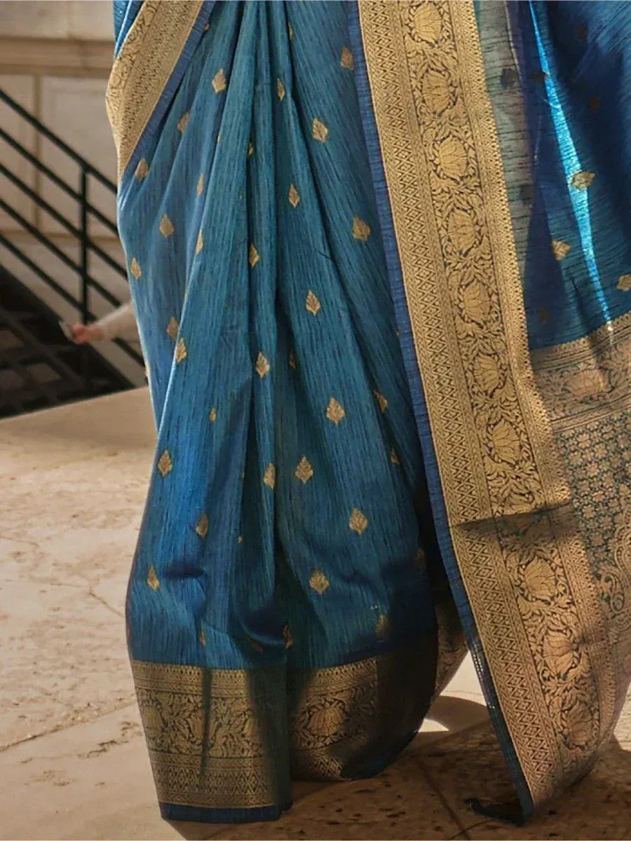 Blue silk saree with gold zari border and floral motifs, elegant ethnic wear for women