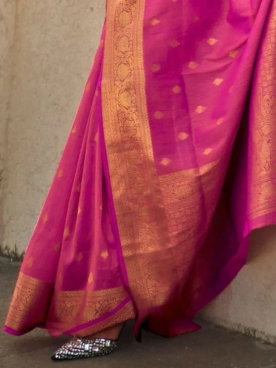 Vibrant pink saree with golden zari border and diamond heels, perfect for Indian ethnic occasions