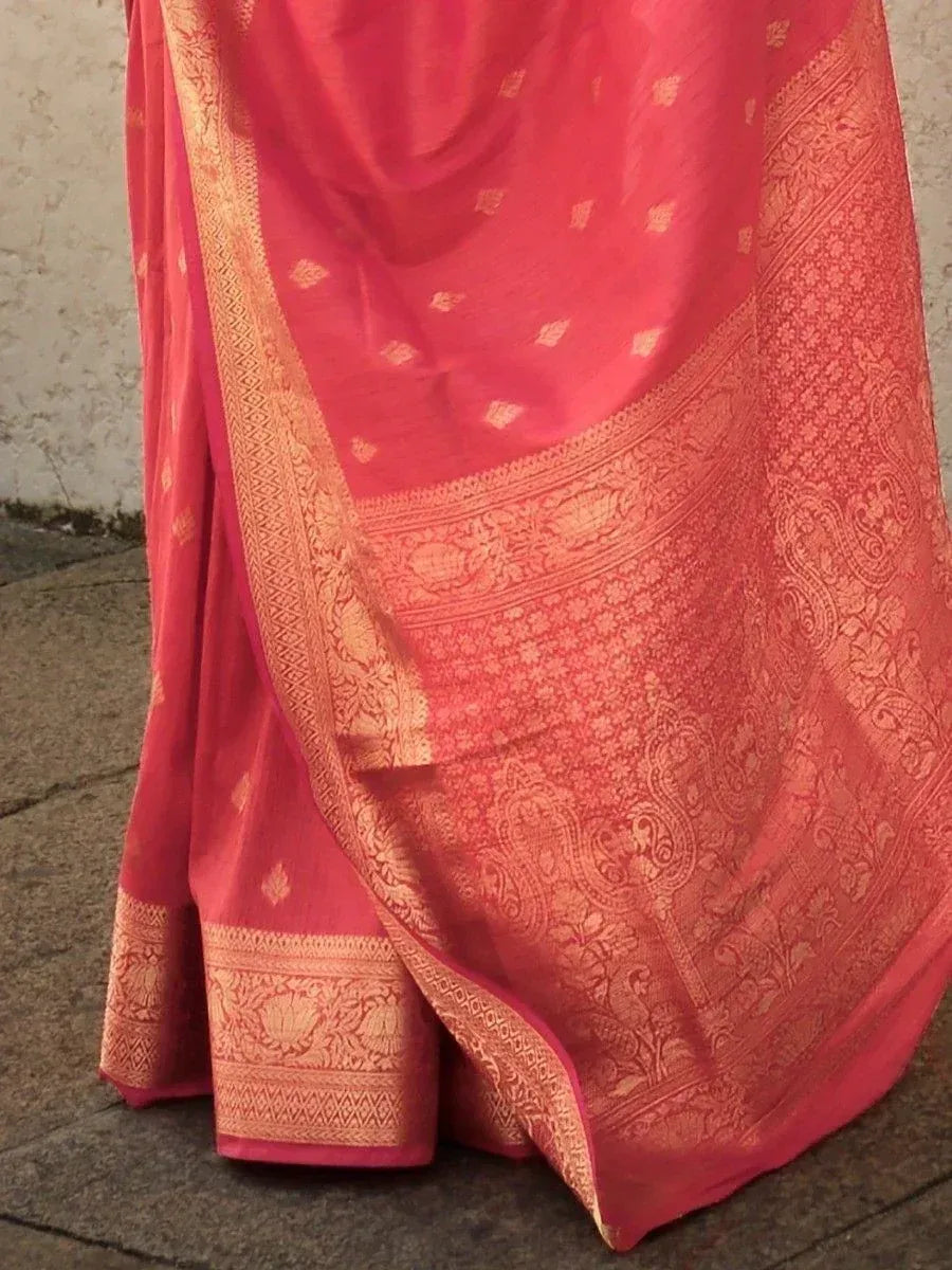 Pink designer saree with gold zari border and floral motifs, ethnic wear for women