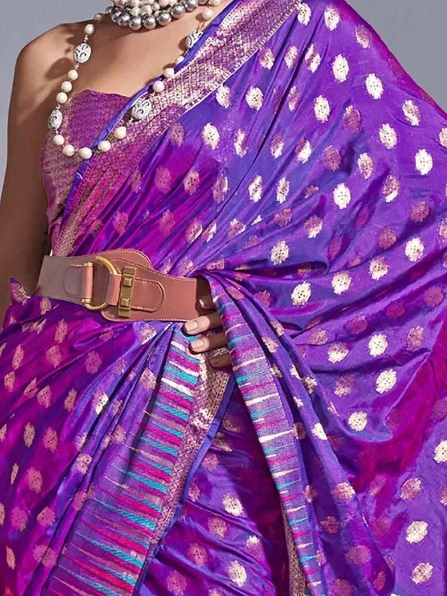 Purple ethnic saree with gold motifs, belt, and pearl necklace for Indian fashion