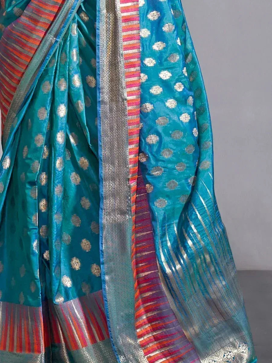 Teal silk saree with gold buttis and colorful striped border, ethnic Indian wear
