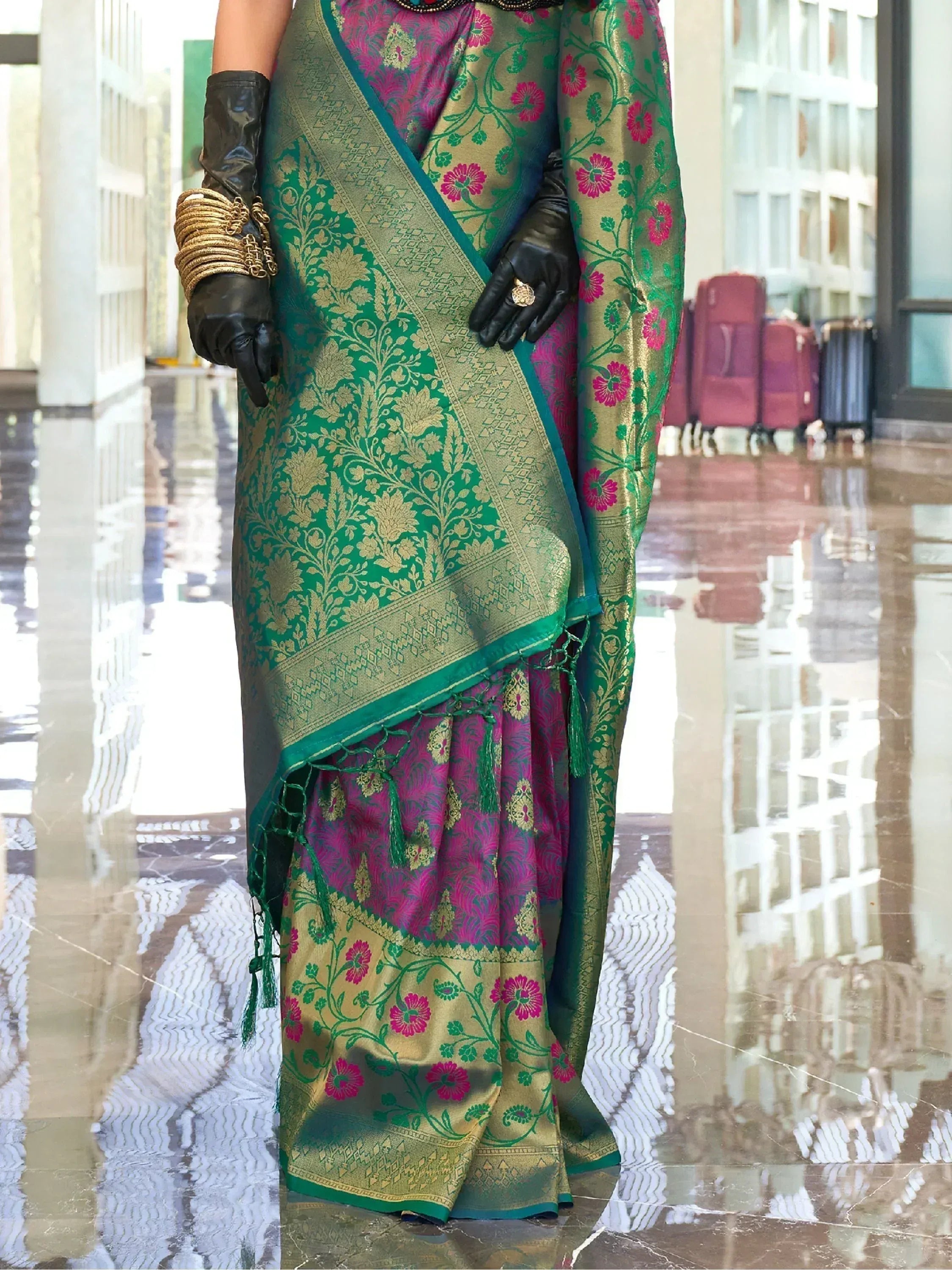 Green and pink floral designer saree with gold embroidery, perfect for ethnic wear occasions