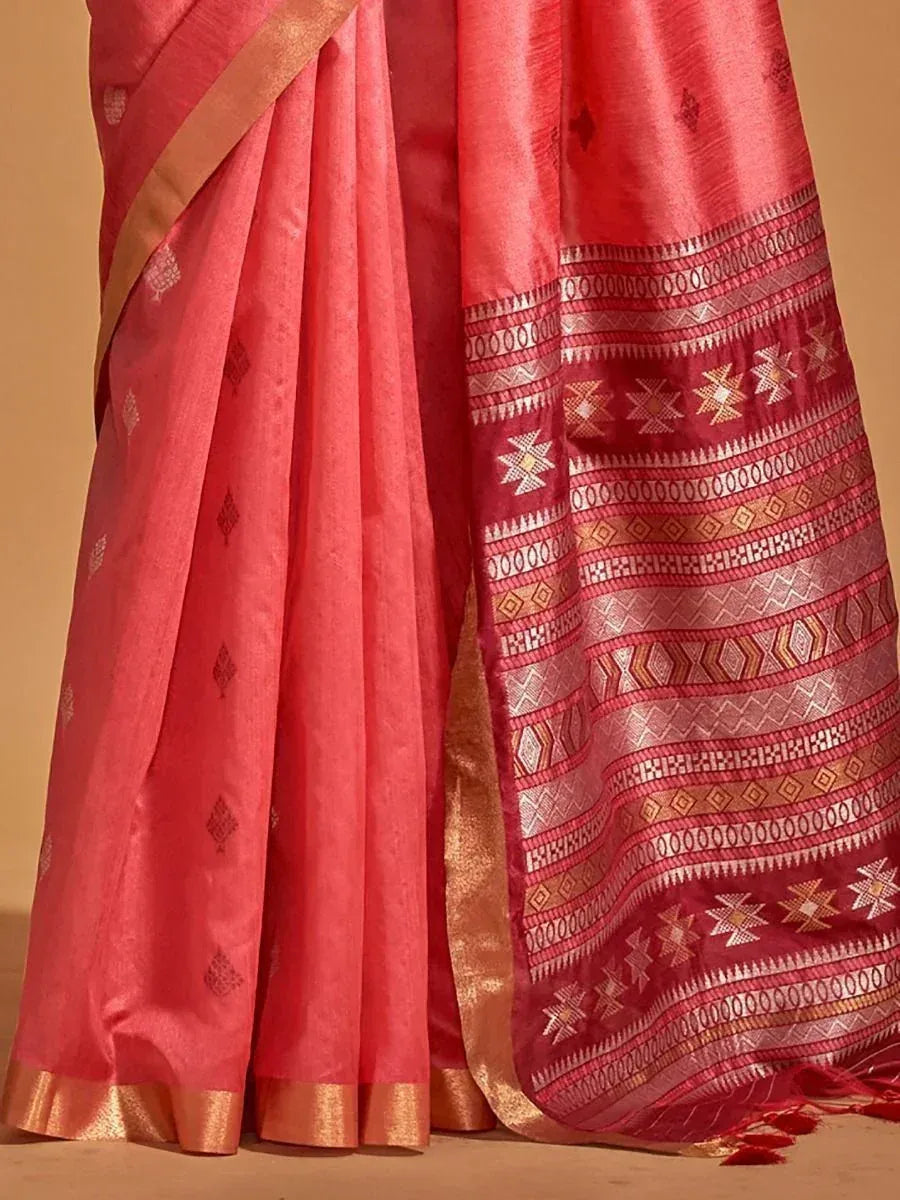 Pink saree with intricate geometric border and golden zari detailing, perfect for ethnic occasions.