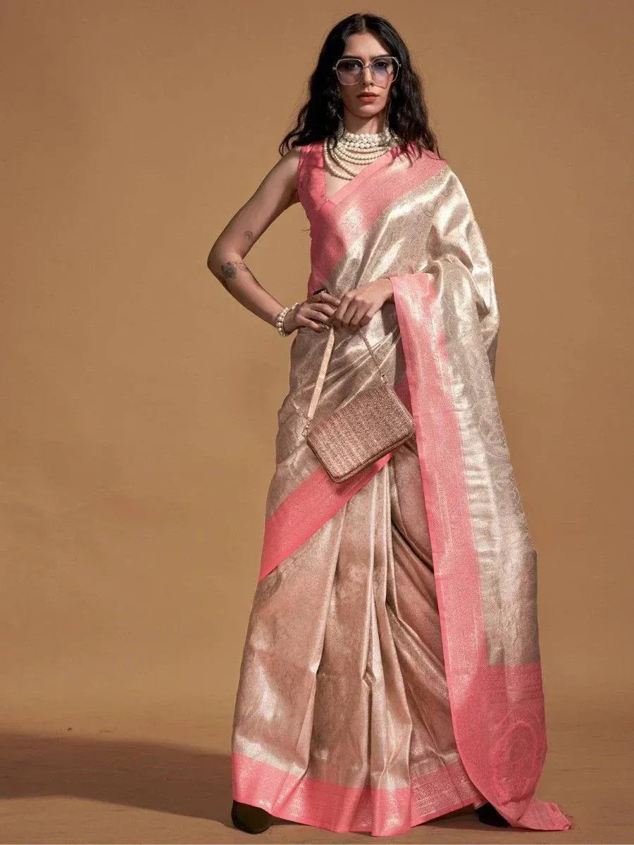 Elegant pink and gold saree with designer blouse, perfect for Indian ethnic wear occasions