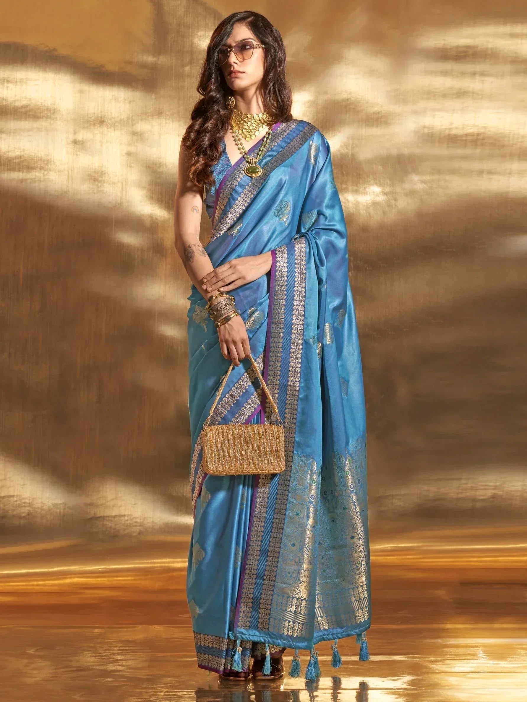 Blue designer saree with gold border, ethnic wear for women, perfect for weddings and festivals