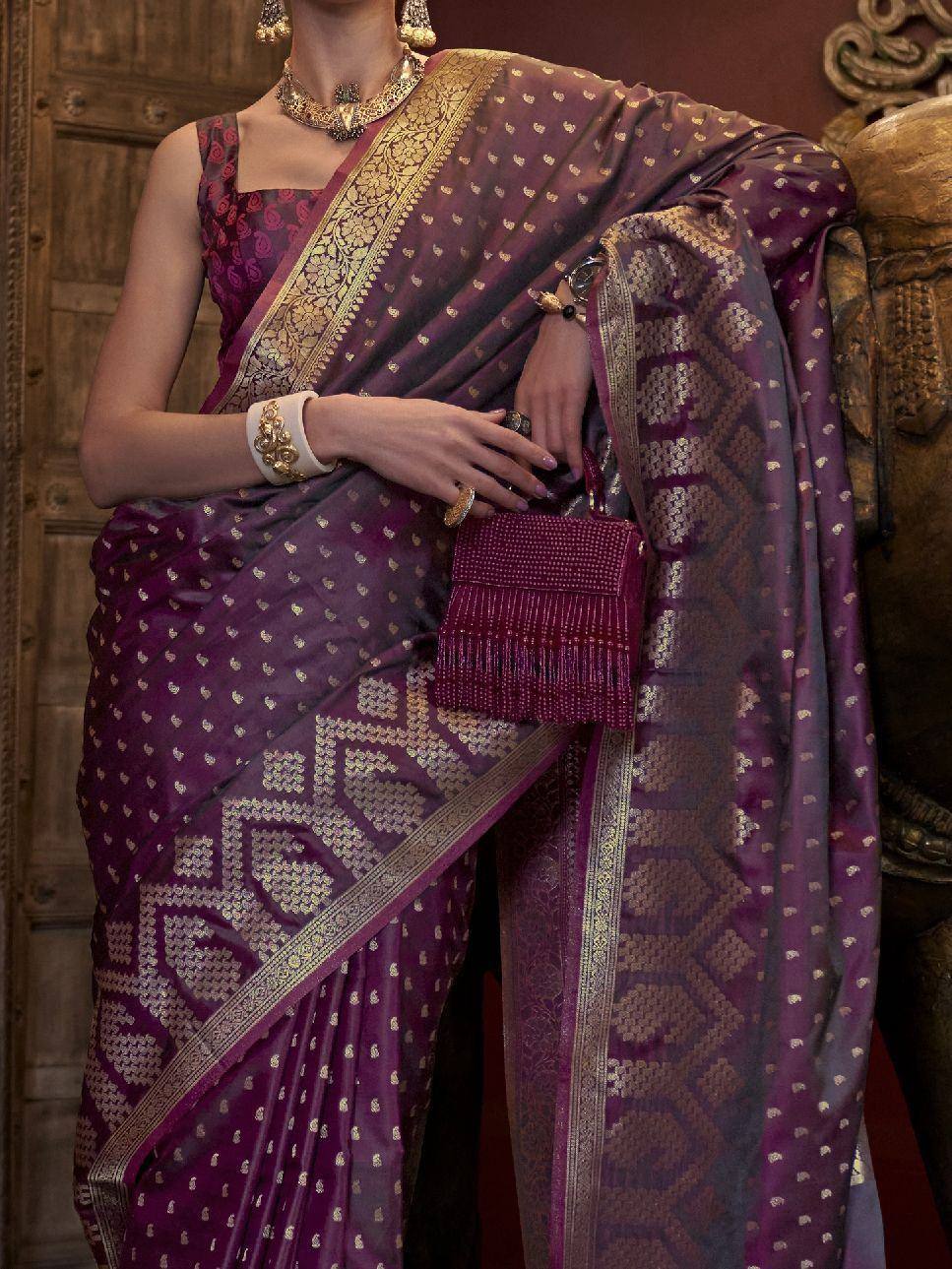 Purple designer saree with gold zari work, perfect for Indian ethnic wear occasions