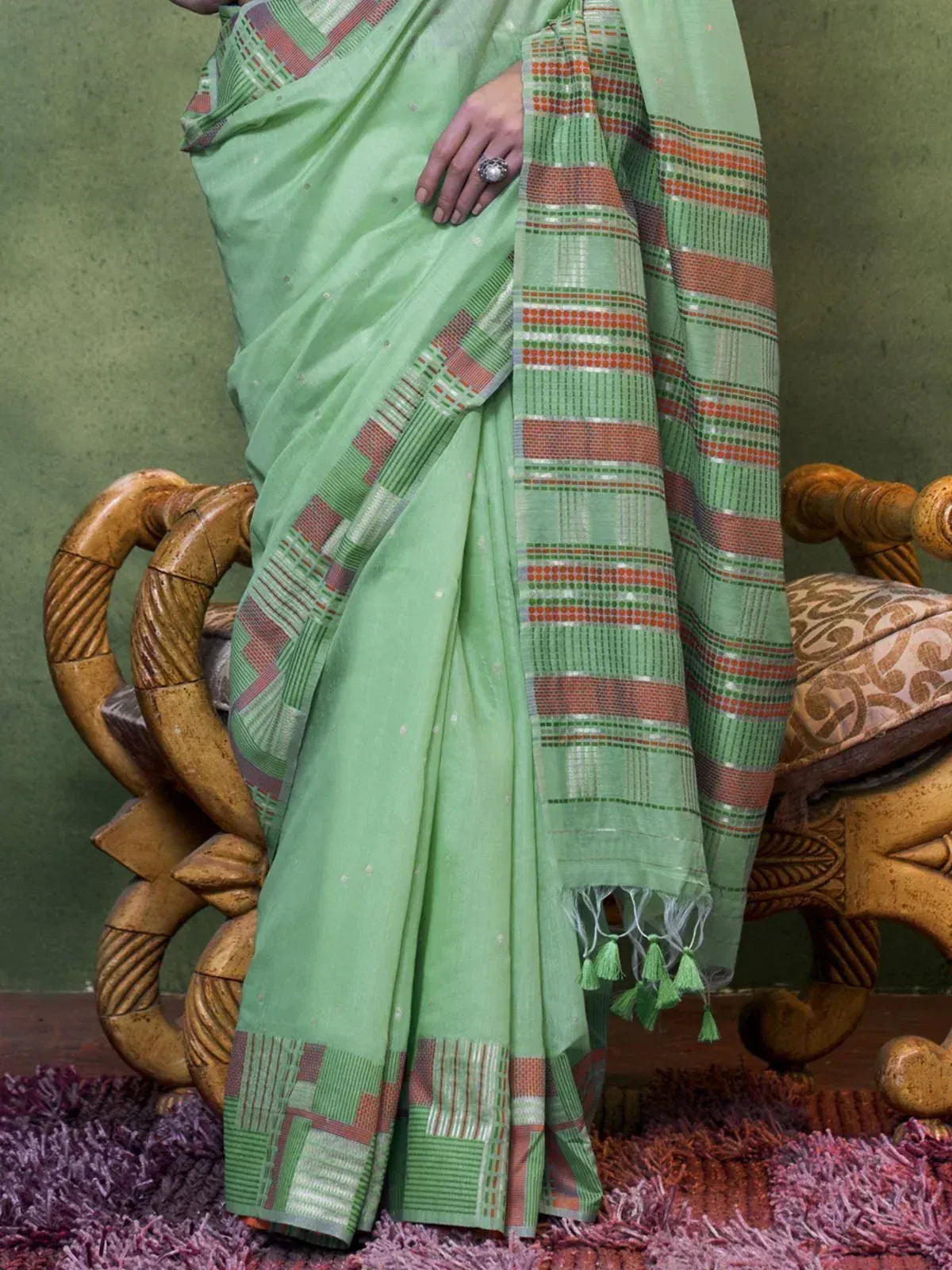 Mint green saree with geometric border and tassels, ethnic Indian wear
