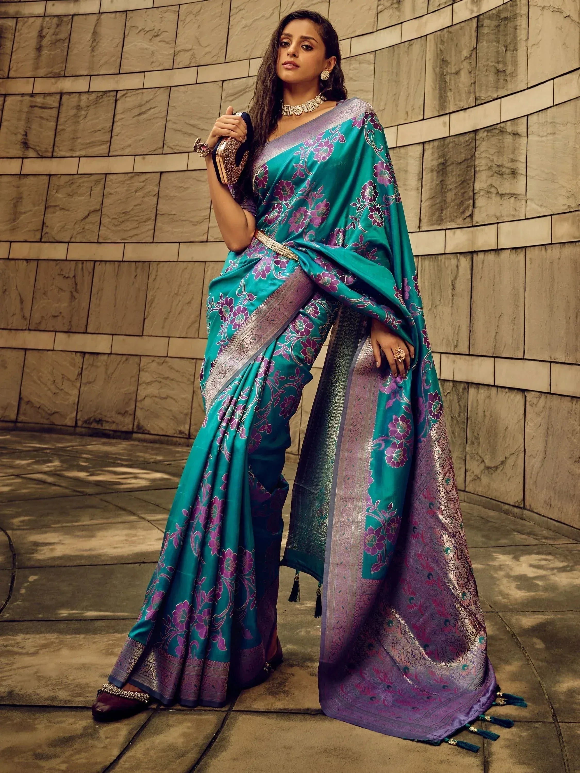 Teal and purple floral saree with intricate border, perfect for Indian ethnic wear occasions