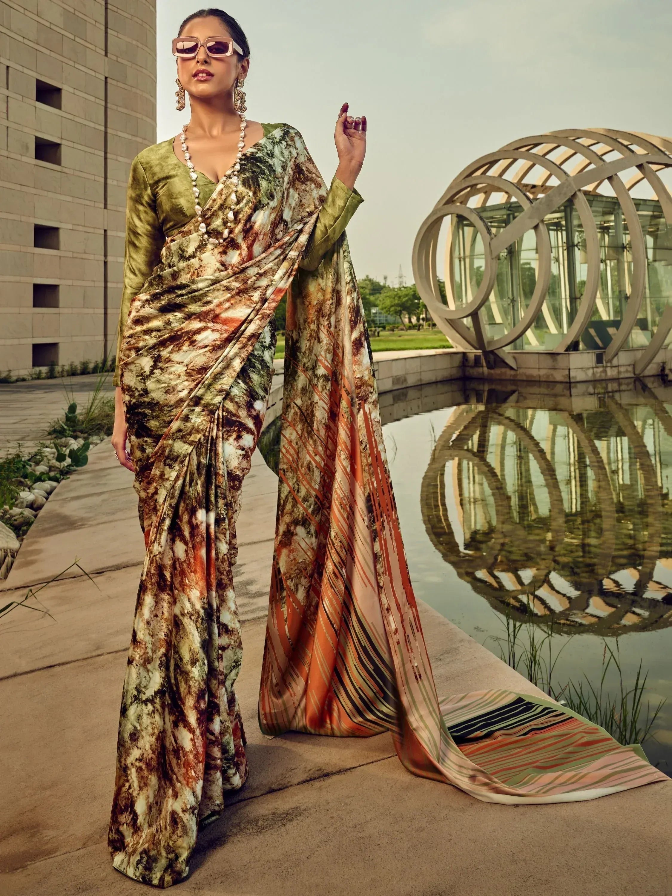Woman in designer printed saree with velvet blouse, ethnic wear for modern occasions