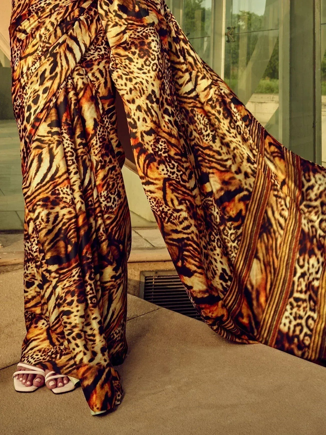Bold animal print saree with tiger and leopard patterns, stylish ethnic wear for modern occasions