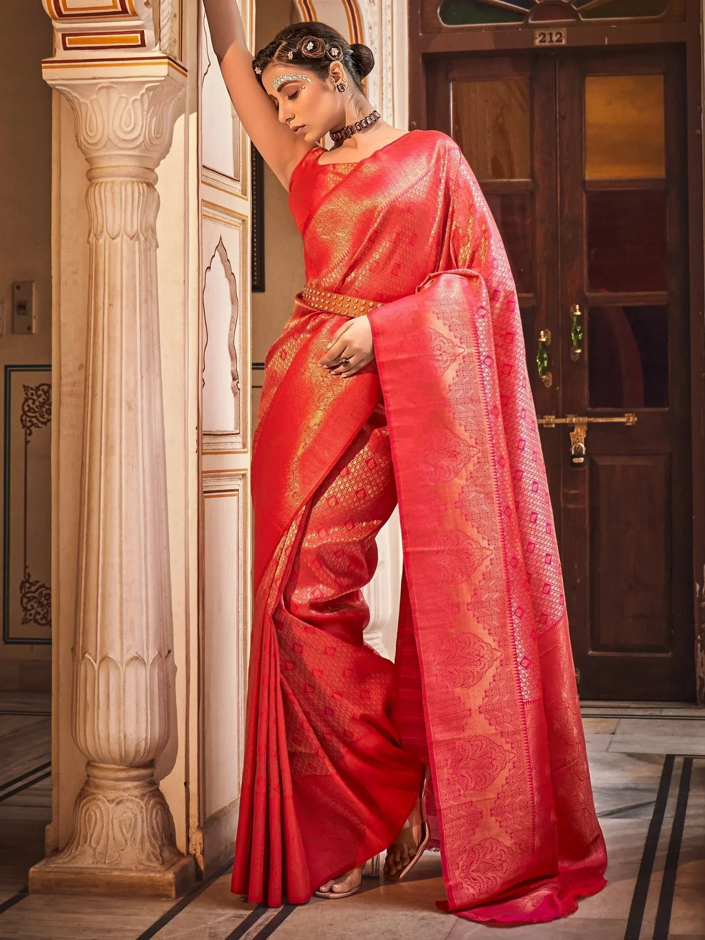 Red designer saree with gold zari work, ethnic Indian wear for weddings and festivals