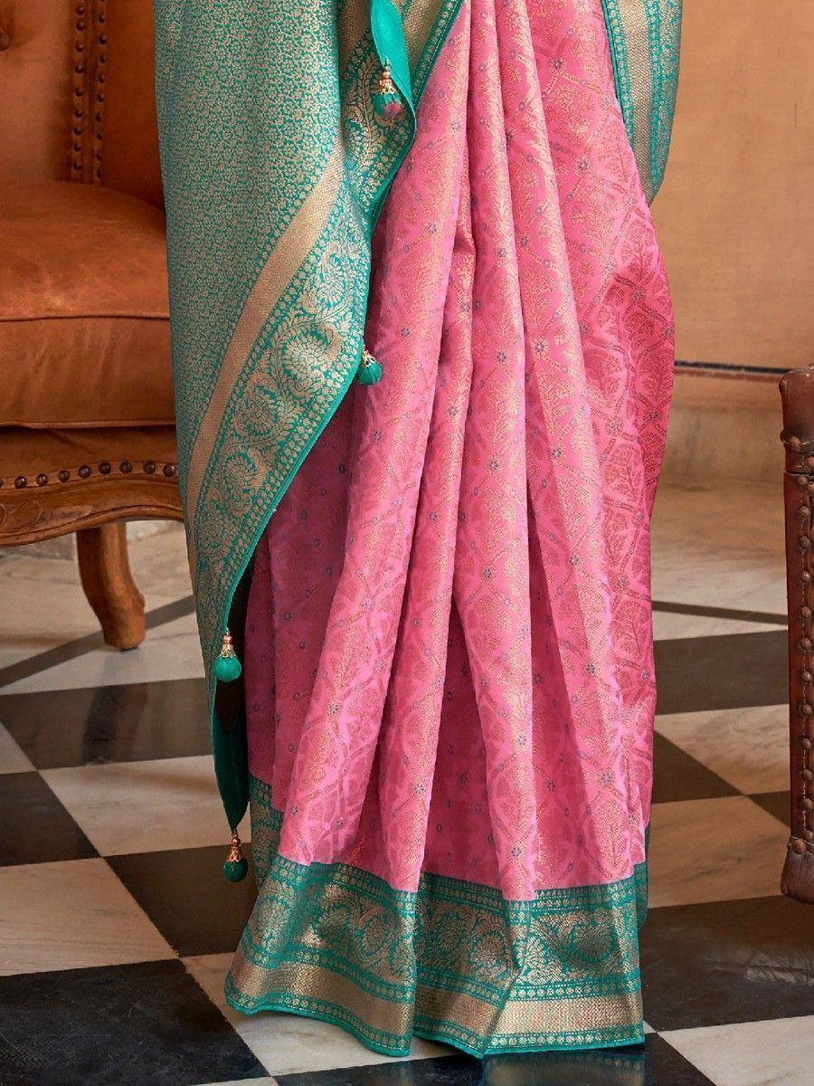 Pink and teal designer saree with gold zari border and tassels, ethnic wear for women