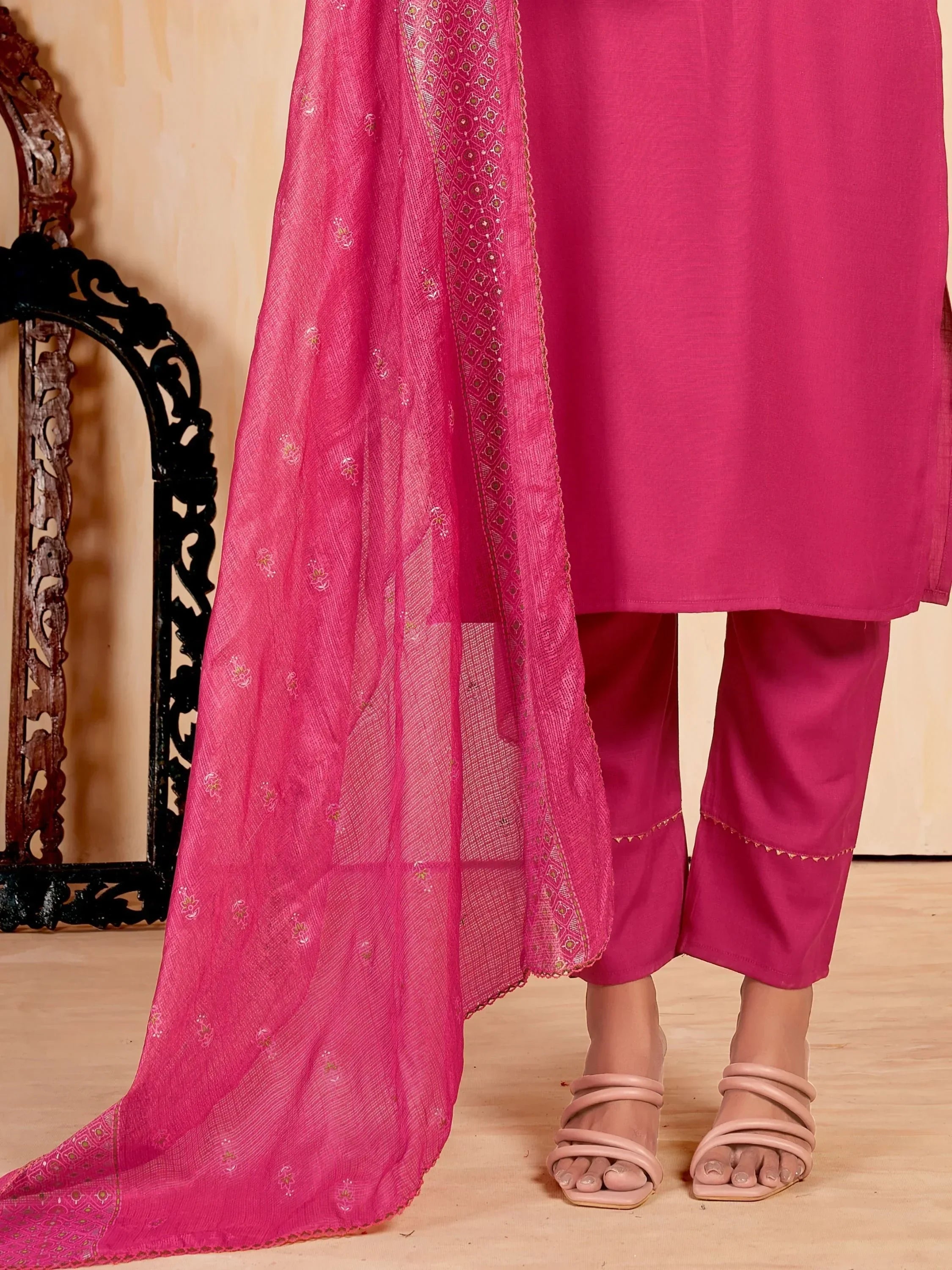 Pink embroidered salwar kameez with matching dupatta and open-toe heels