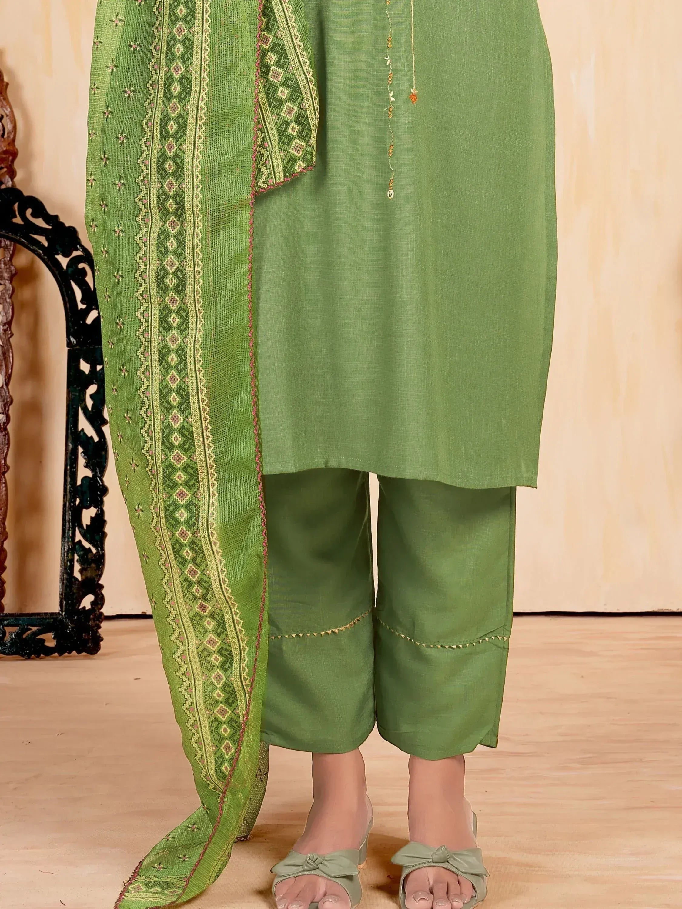 Green ethnic salwar kameez with embroidered dupatta and palazzo pants, perfect for Indian wear