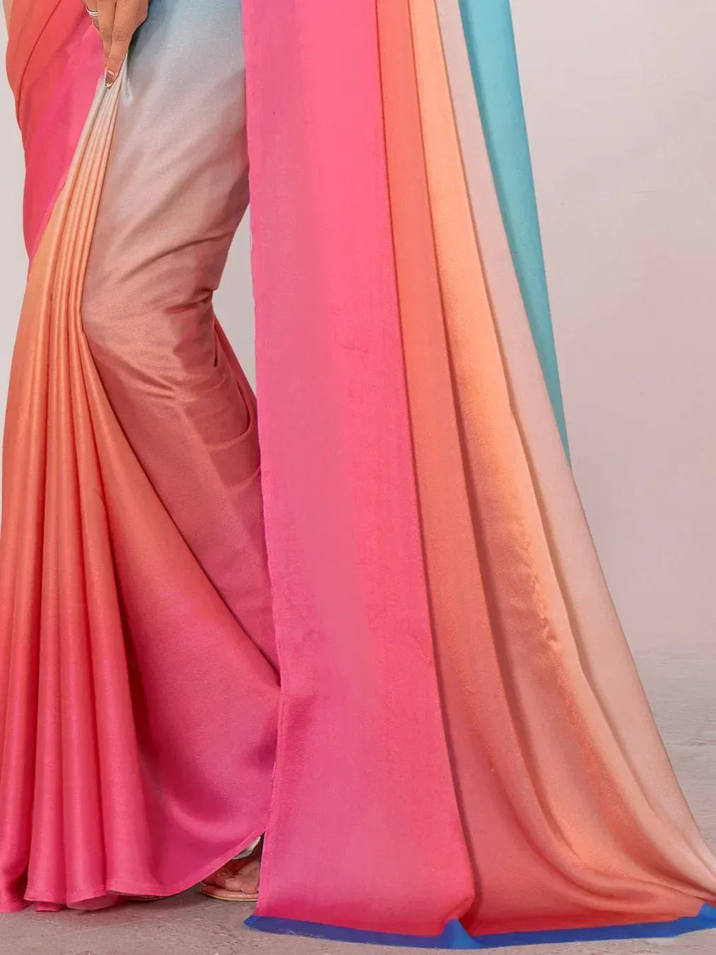 Vibrant ombre saree in pink, peach, and blue hues, perfect for Indian ethnic wear occasions.