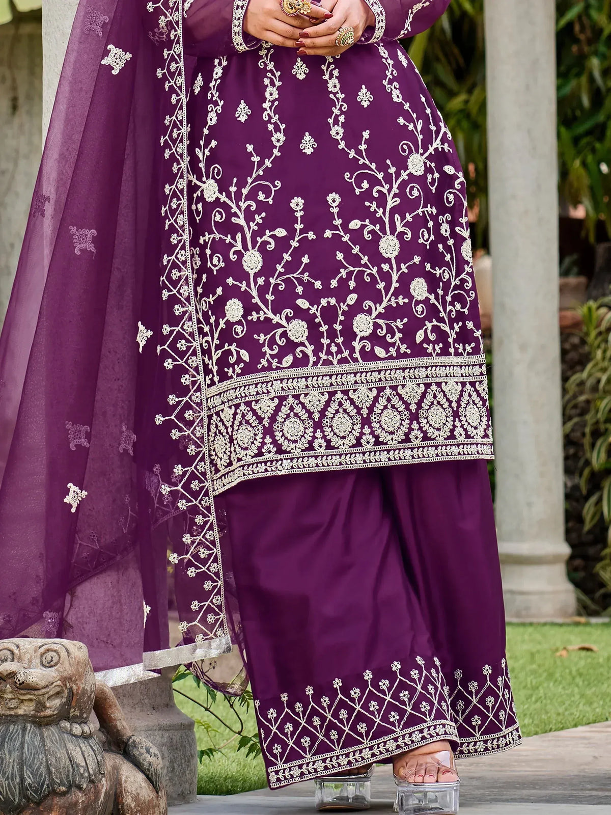 Purple embroidered salwar kameez with floral zari work, perfect for Indian ethnic occasions