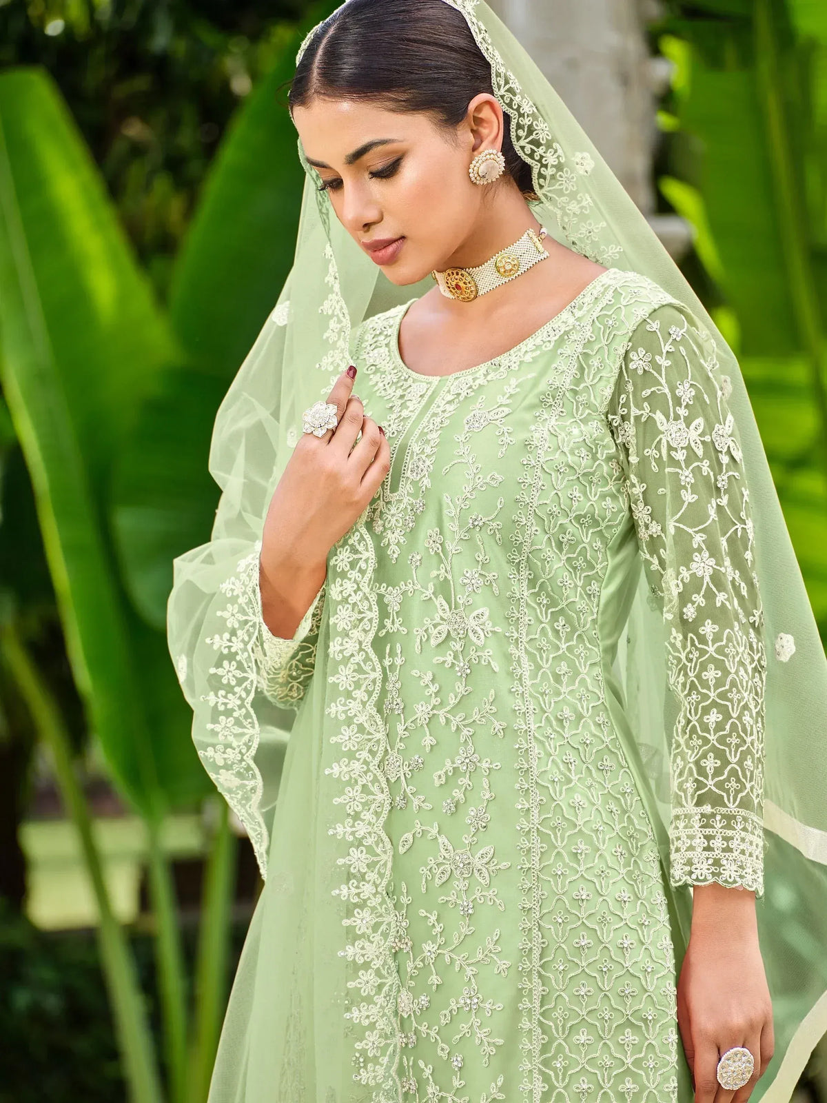 Mint green embroidered salwar kameez with floral lace dupatta, perfect for Indian ethnic occasions