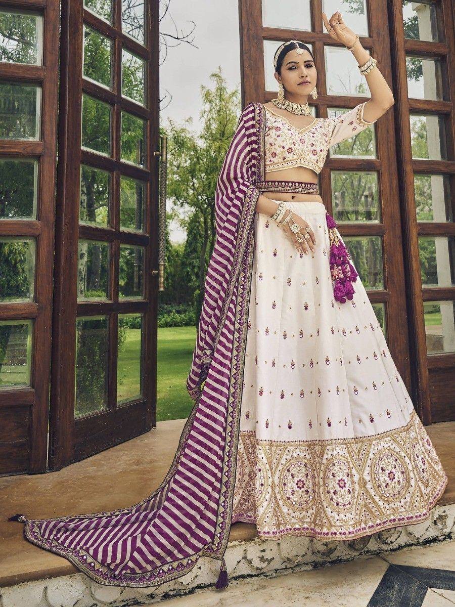 White and purple embroidered lehenga choli with striped dupatta, perfect for Indian ethnic occasions