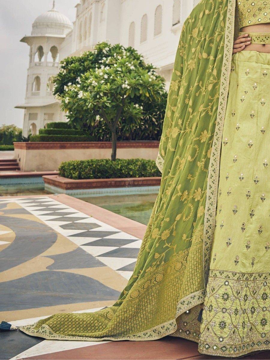 Green embroidered lehenga choli with floral dupatta, perfect for Indian ethnic wear occasions