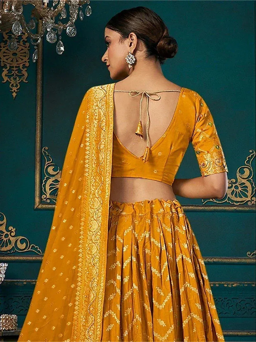 Mustard yellow lehenga choli with back tie blouse and embroidered dupatta, Indian ethnic wear