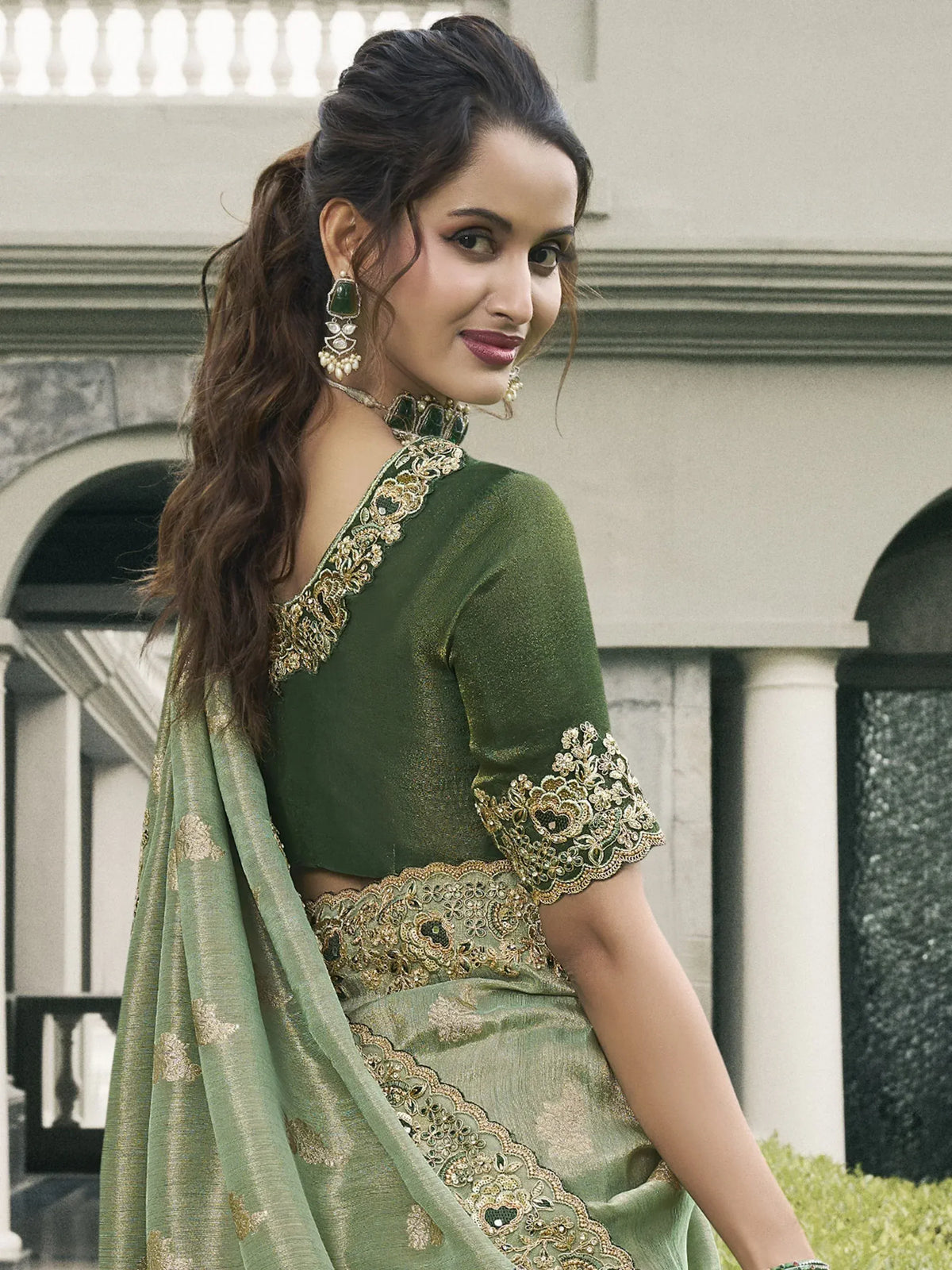 Green embroidered lehenga choli with gold detailing, perfect for Indian ethnic wear and festive occasions.