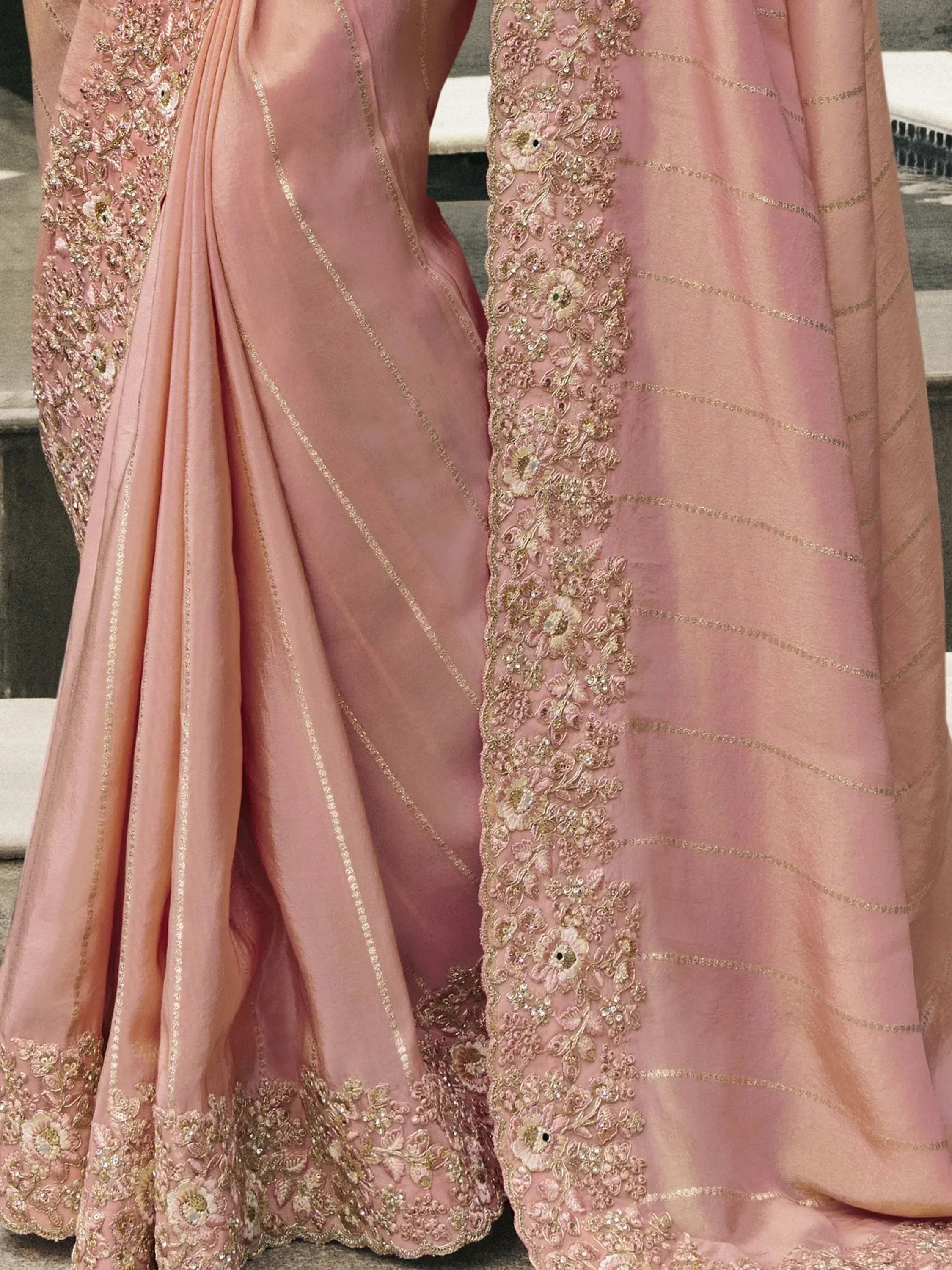 Pink designer lehenga choli with gold floral embroidery and sequin detailing for Indian ethnic wear