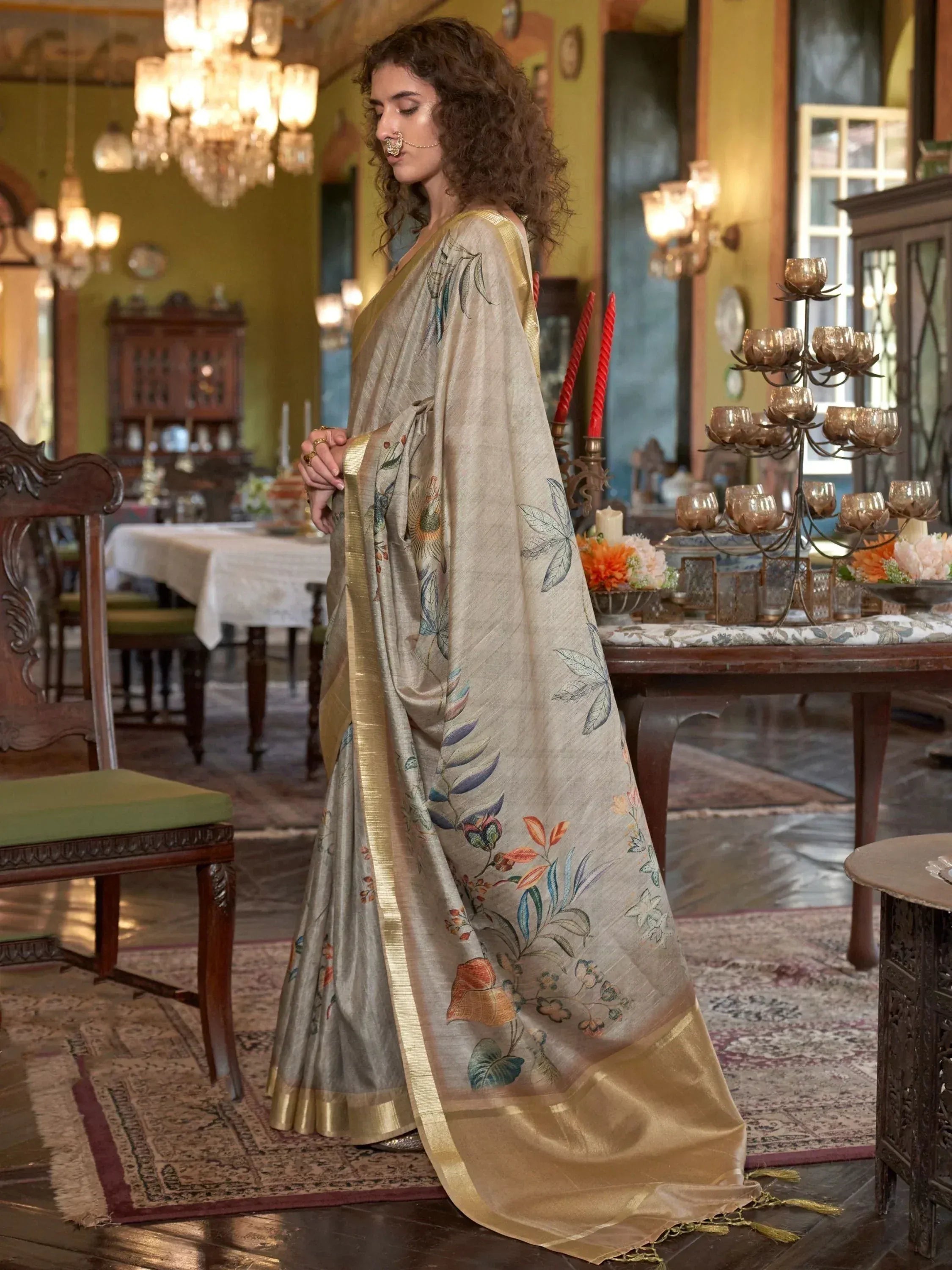 Elegant beige saree with floral print and gold border, perfect for Indian ethnic wear occasions