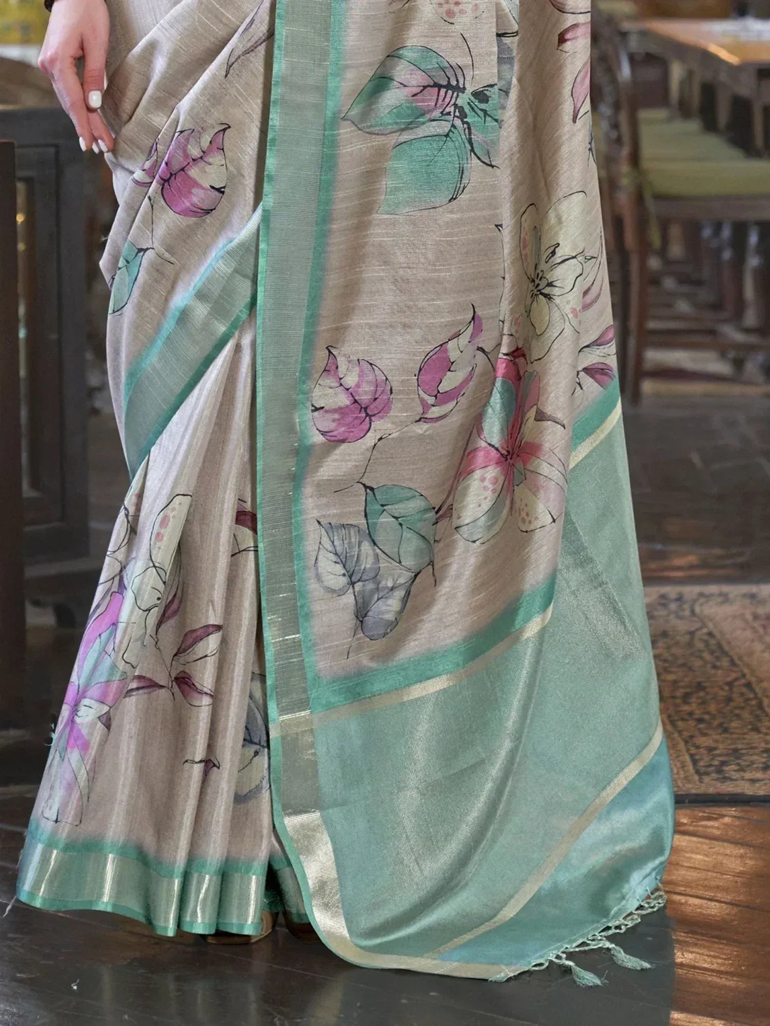 Beige saree with floral print and mint green border, elegant Indian ethnic wear
