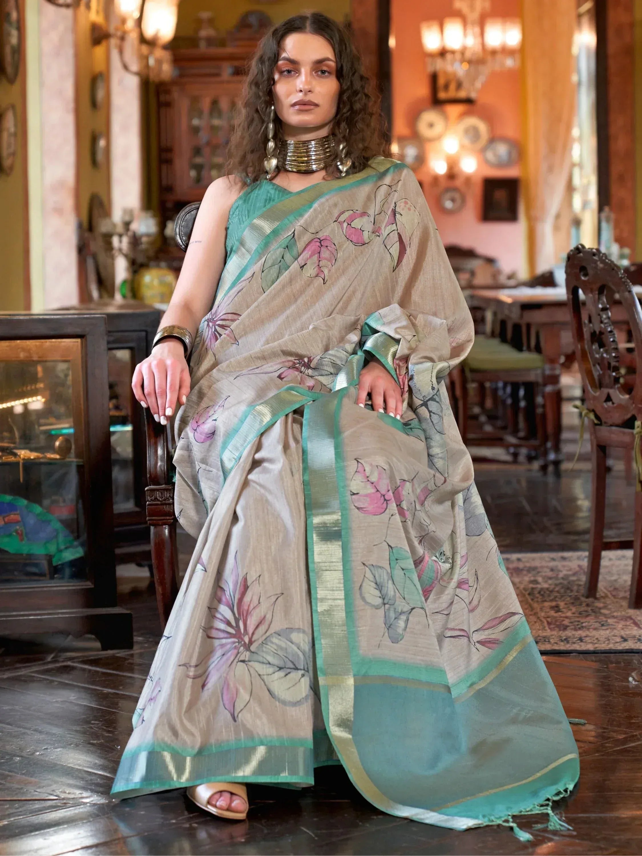 Woman in elegant floral print saree with green border, Indian ethnic wear