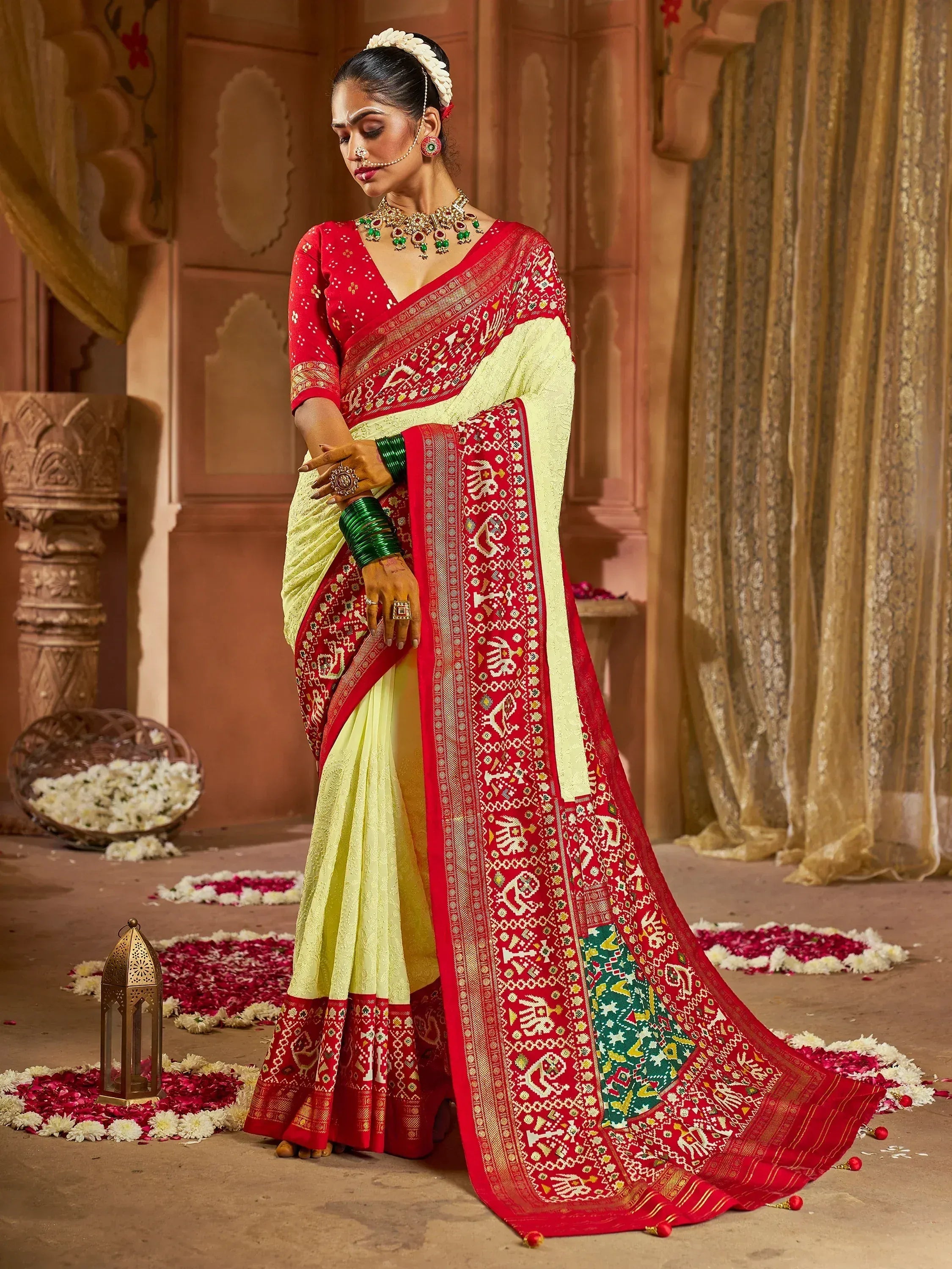 Red and yellow ethnic saree with intricate embroidery, perfect for Indian weddings and festive occasions