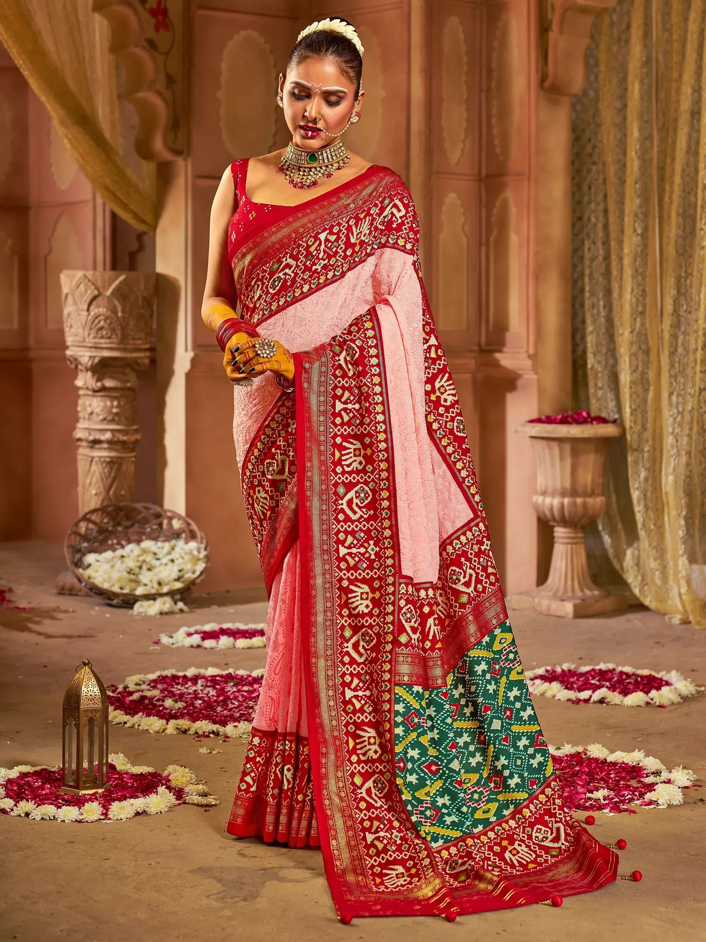 Red and pink ethnic saree with intricate embroidery, perfect for Indian weddings and festive occasions
