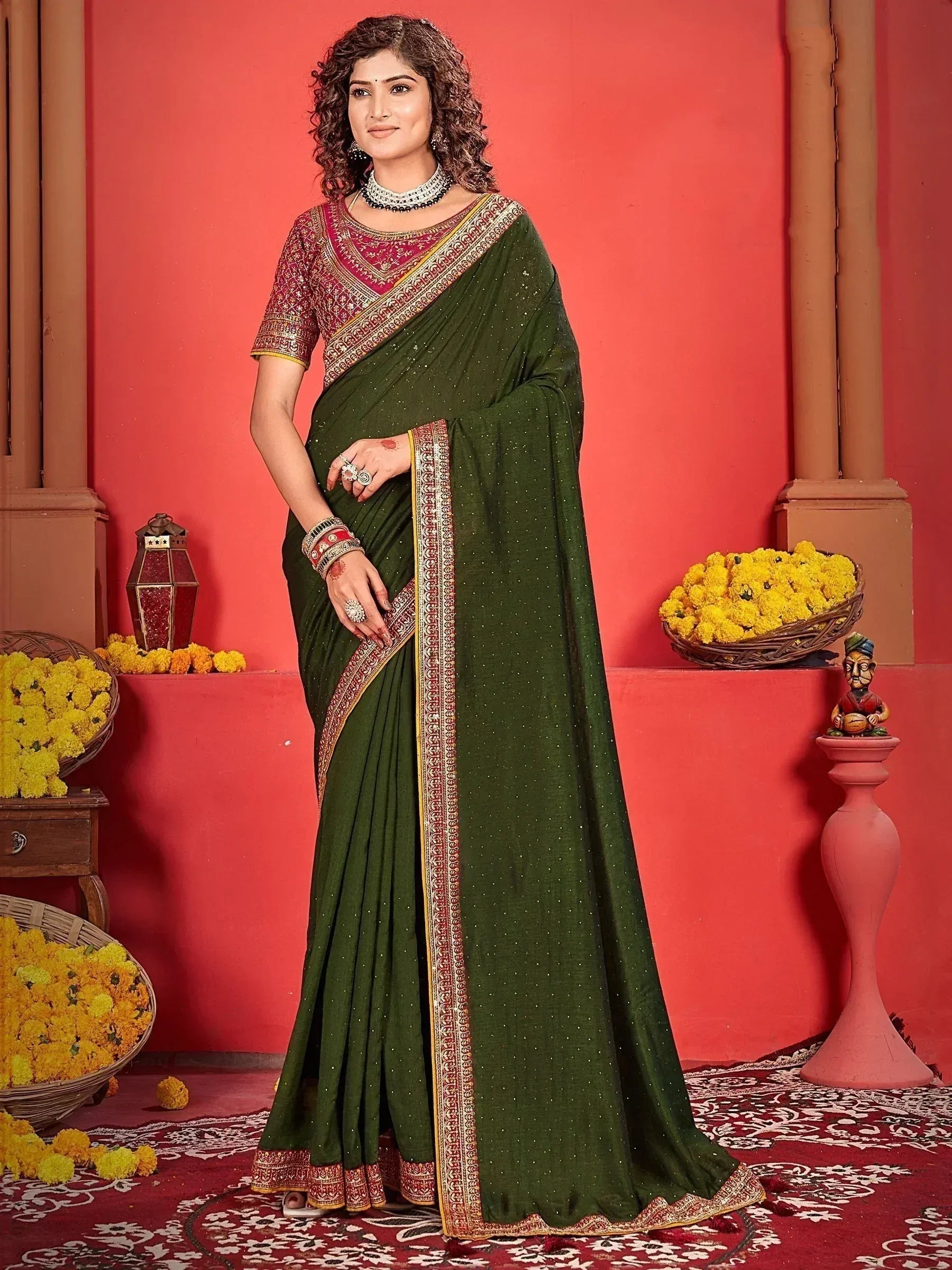Elegant green saree with embroidered border and matching blouse, styled for Indian ethnic occasions