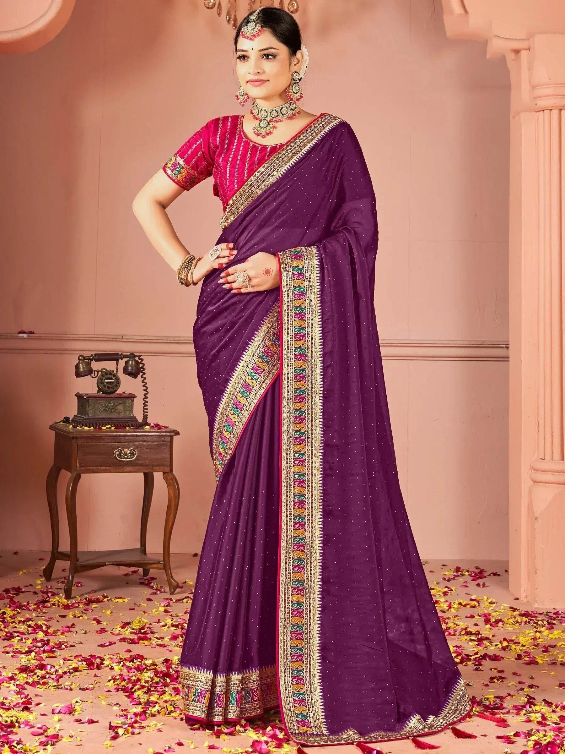 Purple designer saree with gold embroidery and pink blouse, perfect for Indian ethnic wear occasions