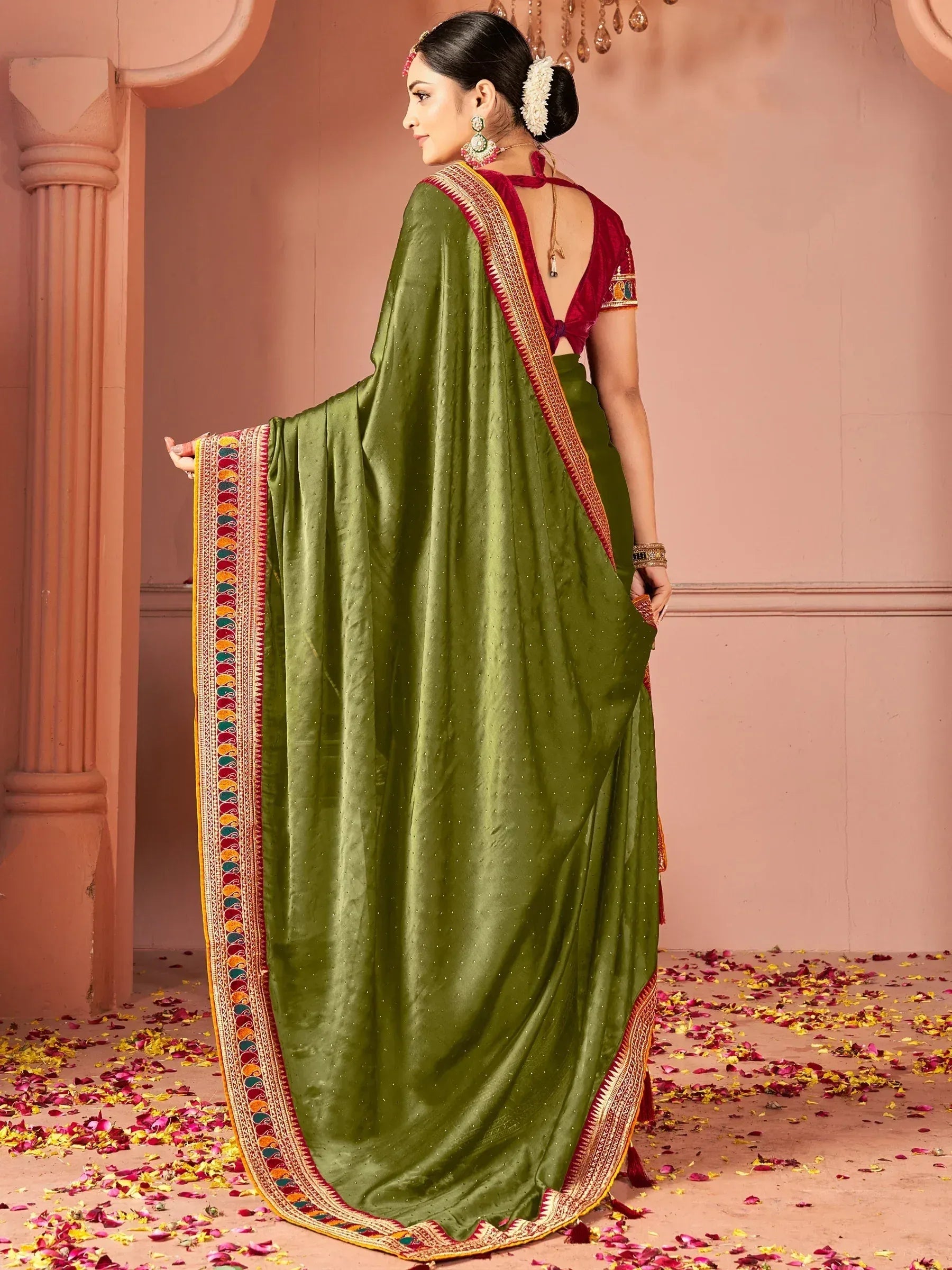 Olive green designer saree with embroidered border and maroon blouse, perfect for Indian ethnic wear occasions.