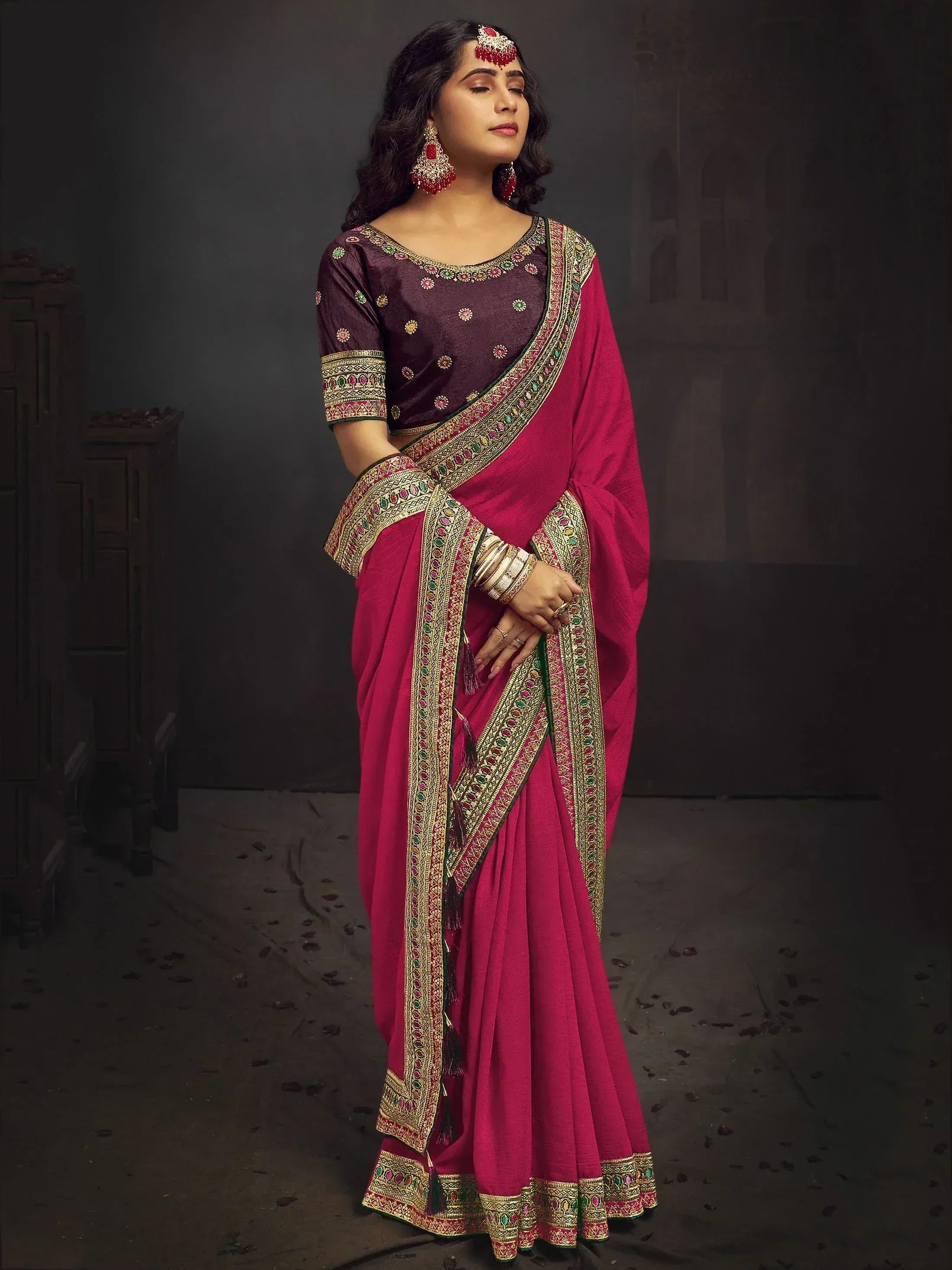 Elegant pink and maroon saree with gold embroidery, perfect for Indian ethnic wear occasions