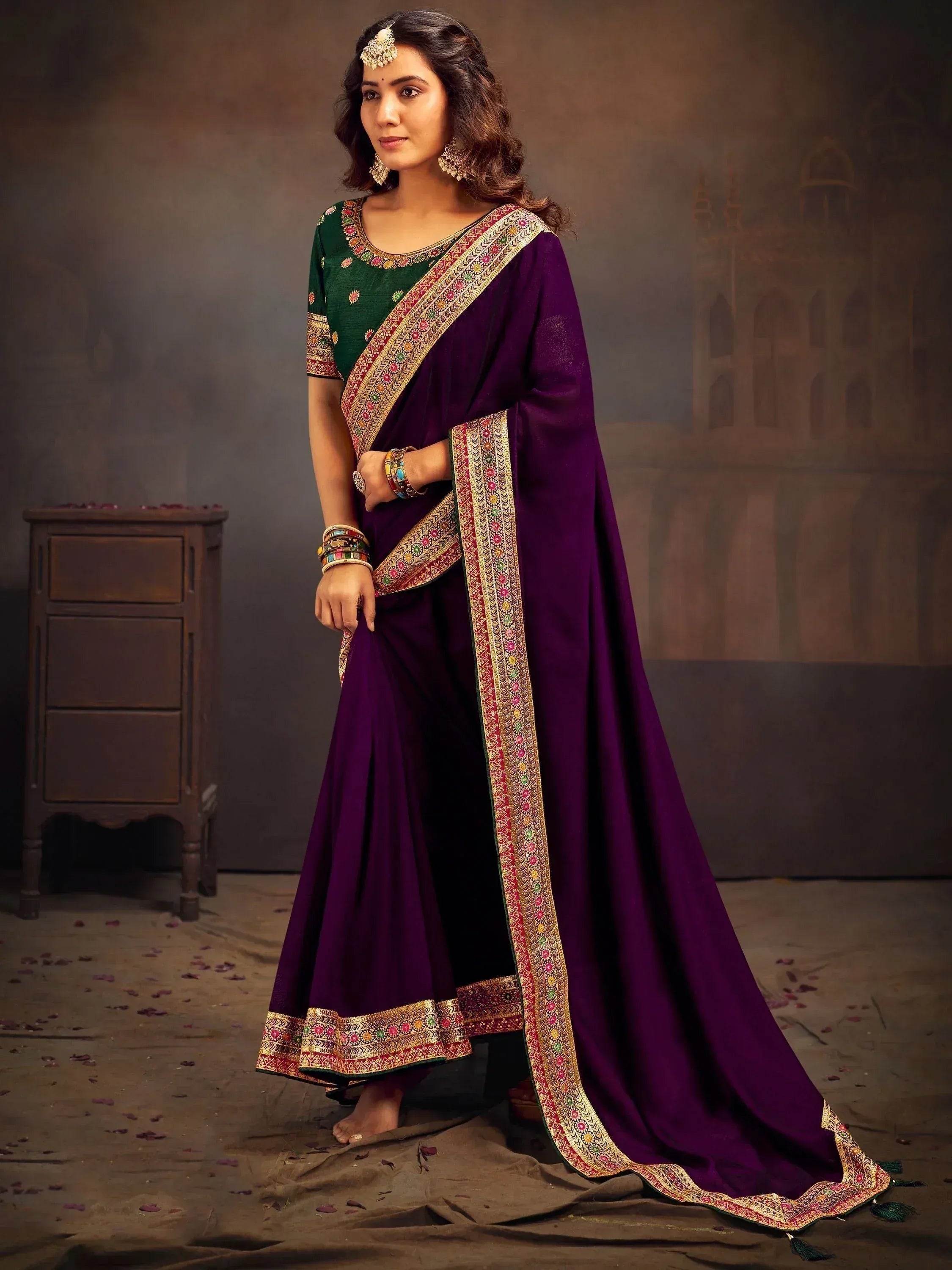 Purple embroidered saree with green blouse, traditional Indian ethnic wear for women