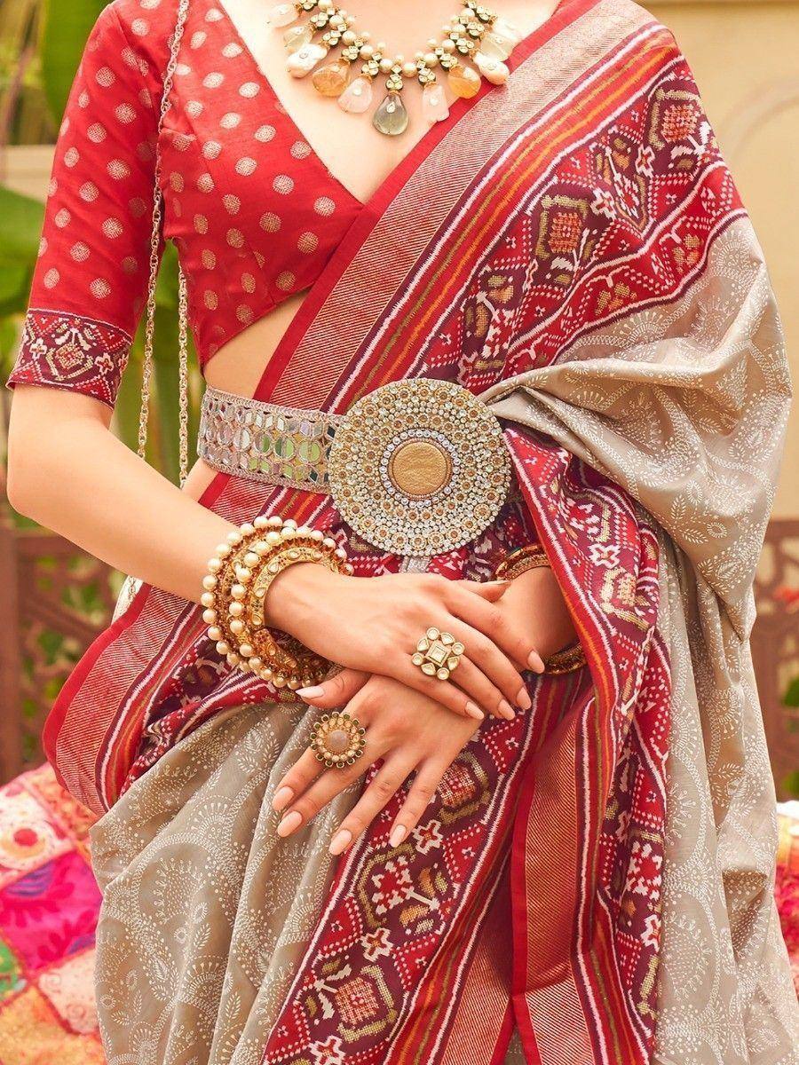 Red and beige printed saree with gold jewelry, ethnic wear for women